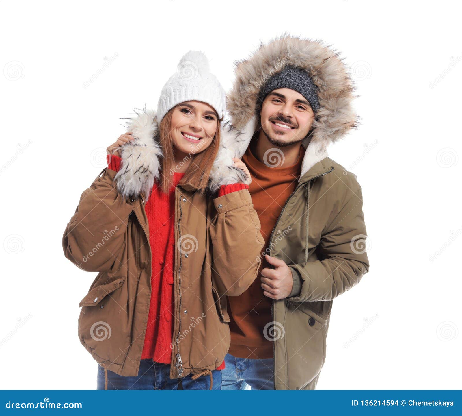 Young Couple Wearing Warm Clothes on White Background Stock Photo ...