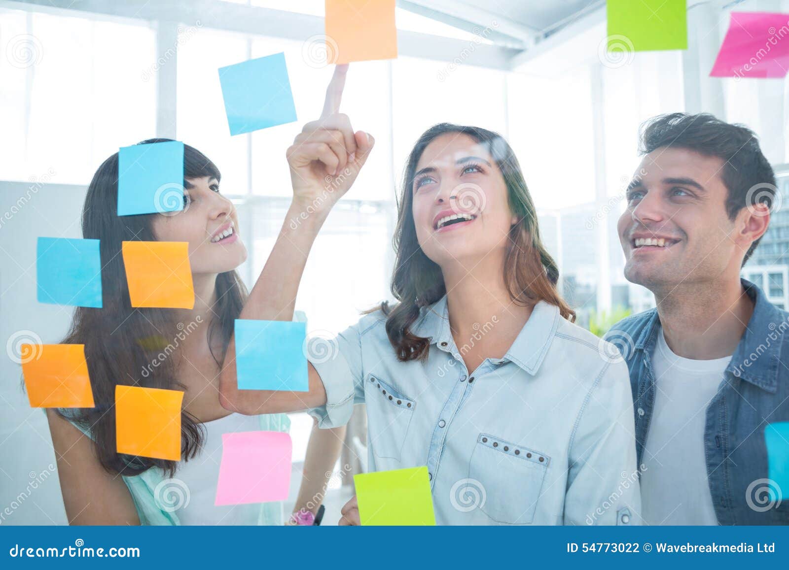 Young Creative Business People Looking at Photo Editor Stock Photo