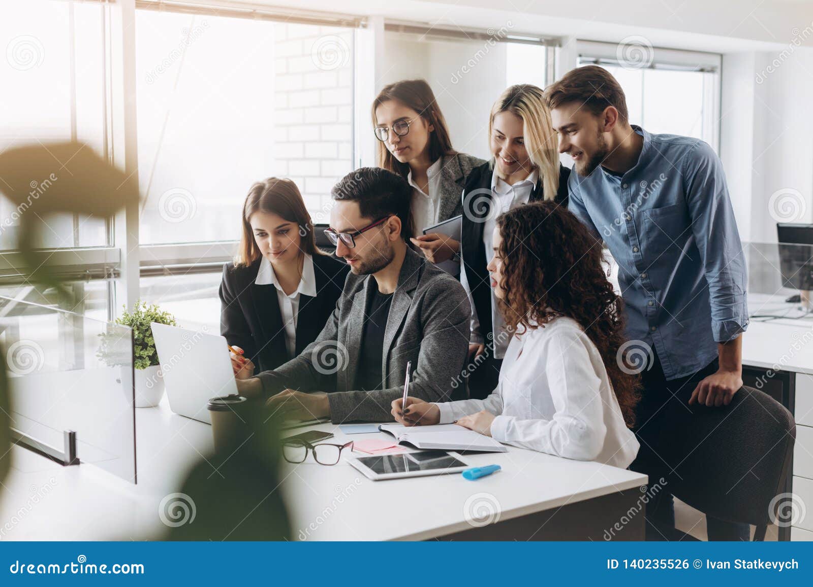 Young Creative Managers Team Working with New Project in Modern Office