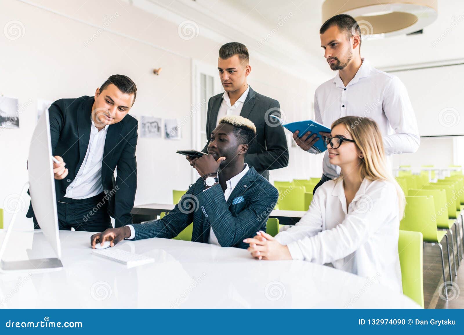 Young Creative Managers Team Working with New Project in Modern Office