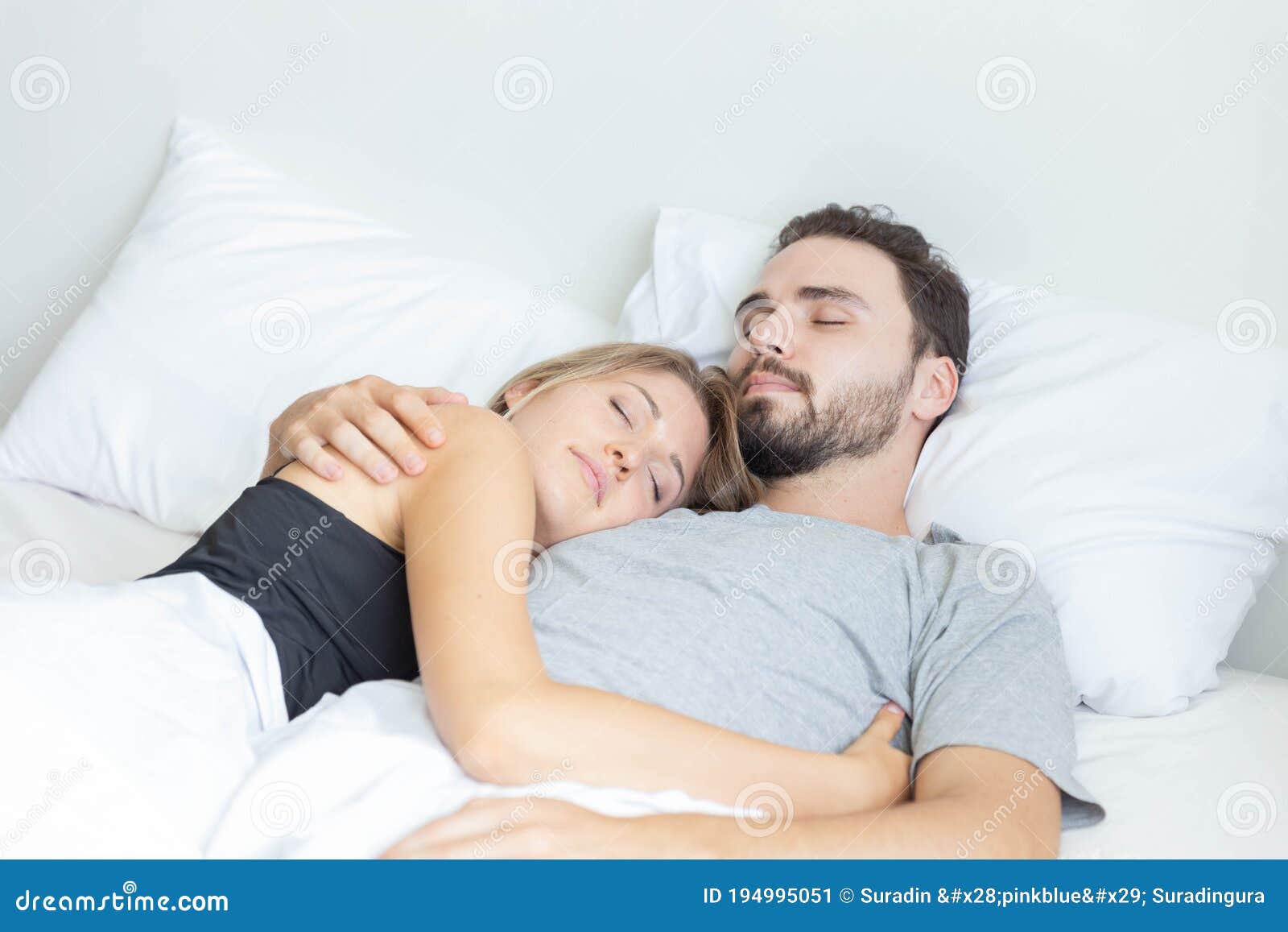 Young Cute Couple Hug and Sleep Together in Bed Stock Image ...
