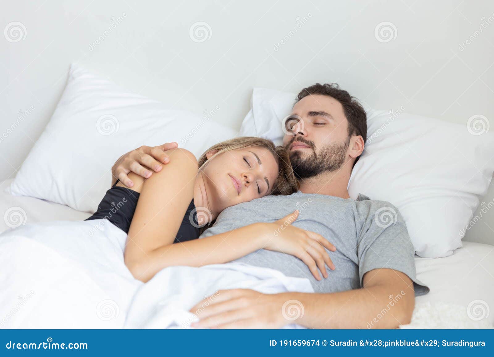 Young Cute Couple Hug and Sleep Together in Bed Stock Photo ...