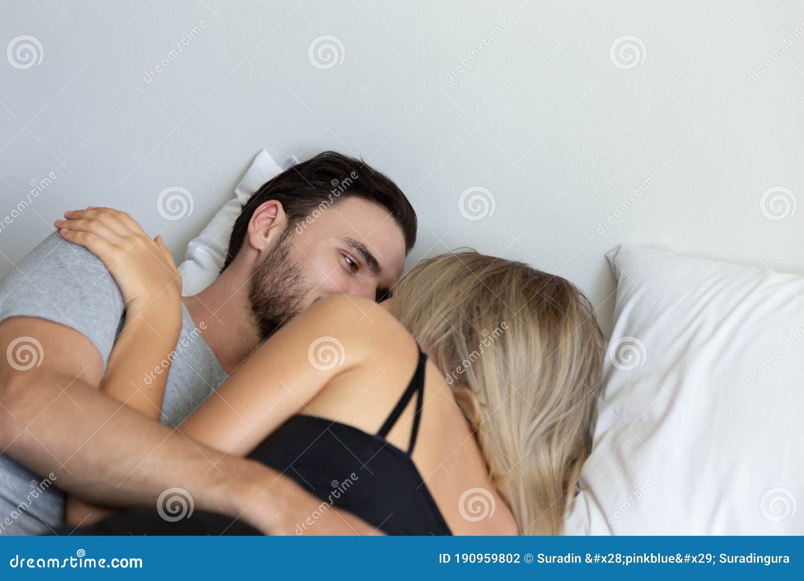 Young Cute Couple Hug and Sleep Together in Bed Stock Photo ...