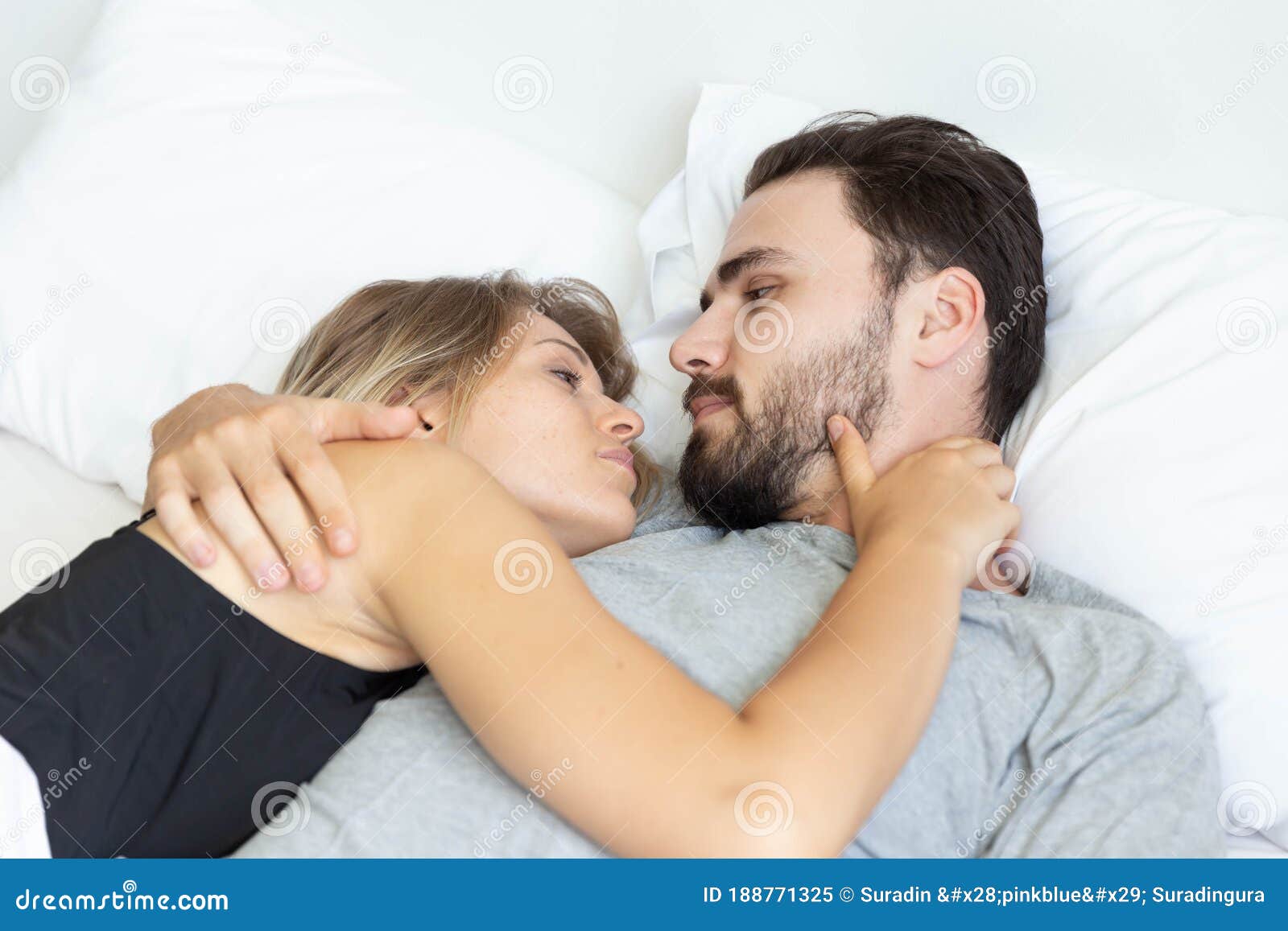 Young Cute Couple Hug and Sleep Together in Bed Stock Image ...