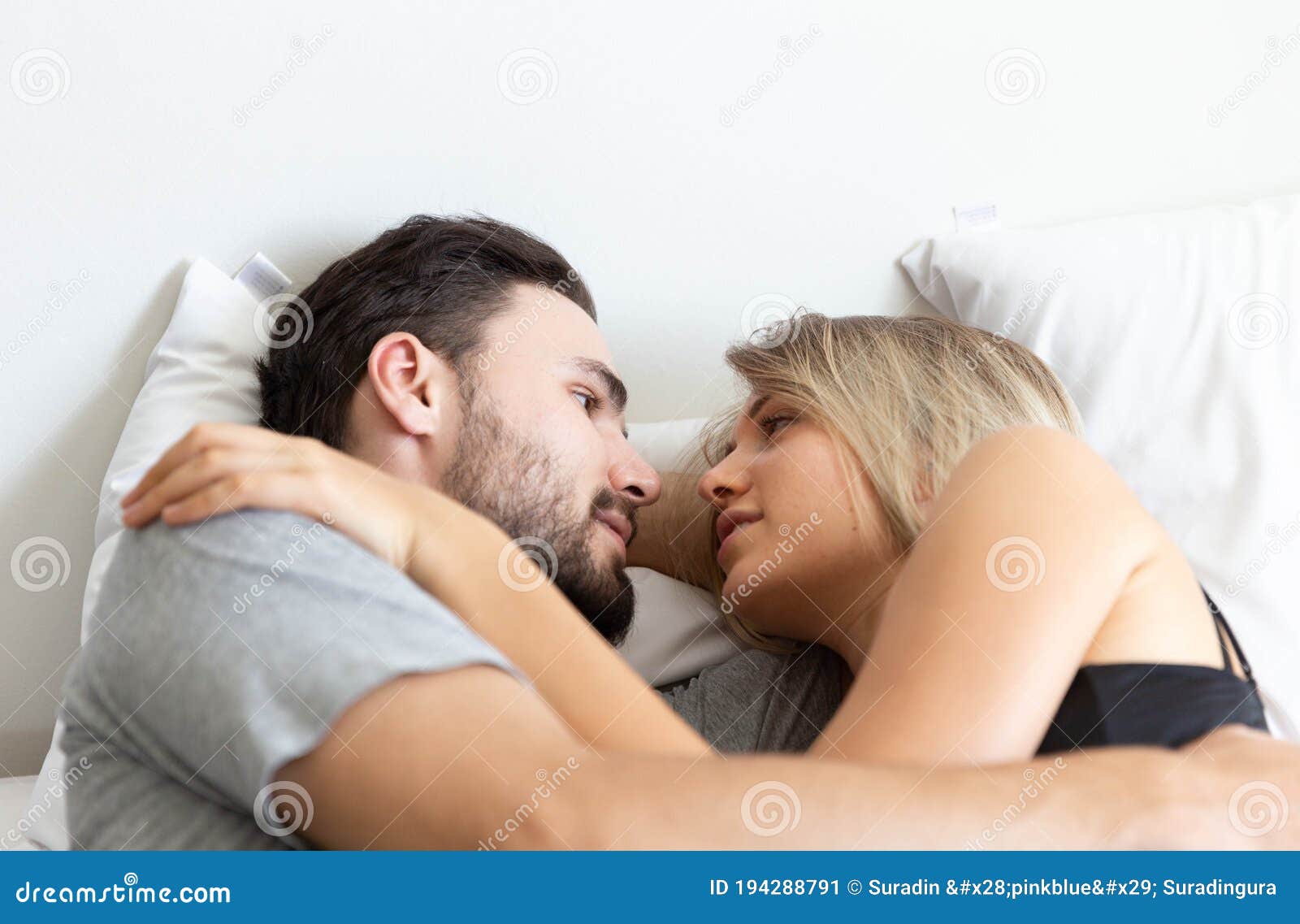 Young Cute Couple Hug and Sleep Together in Bed Stock Image ...