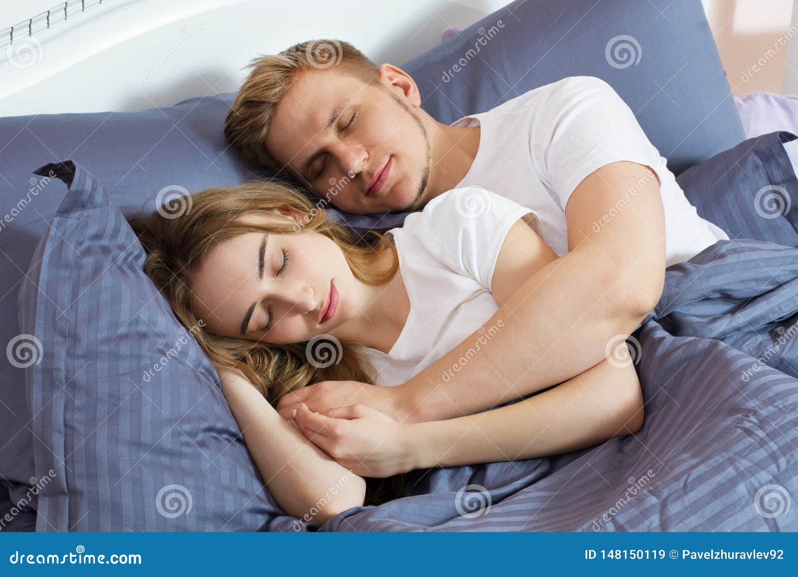 Young Cute Couple Sleeping Together in Bed. Comfortable Bed and ...