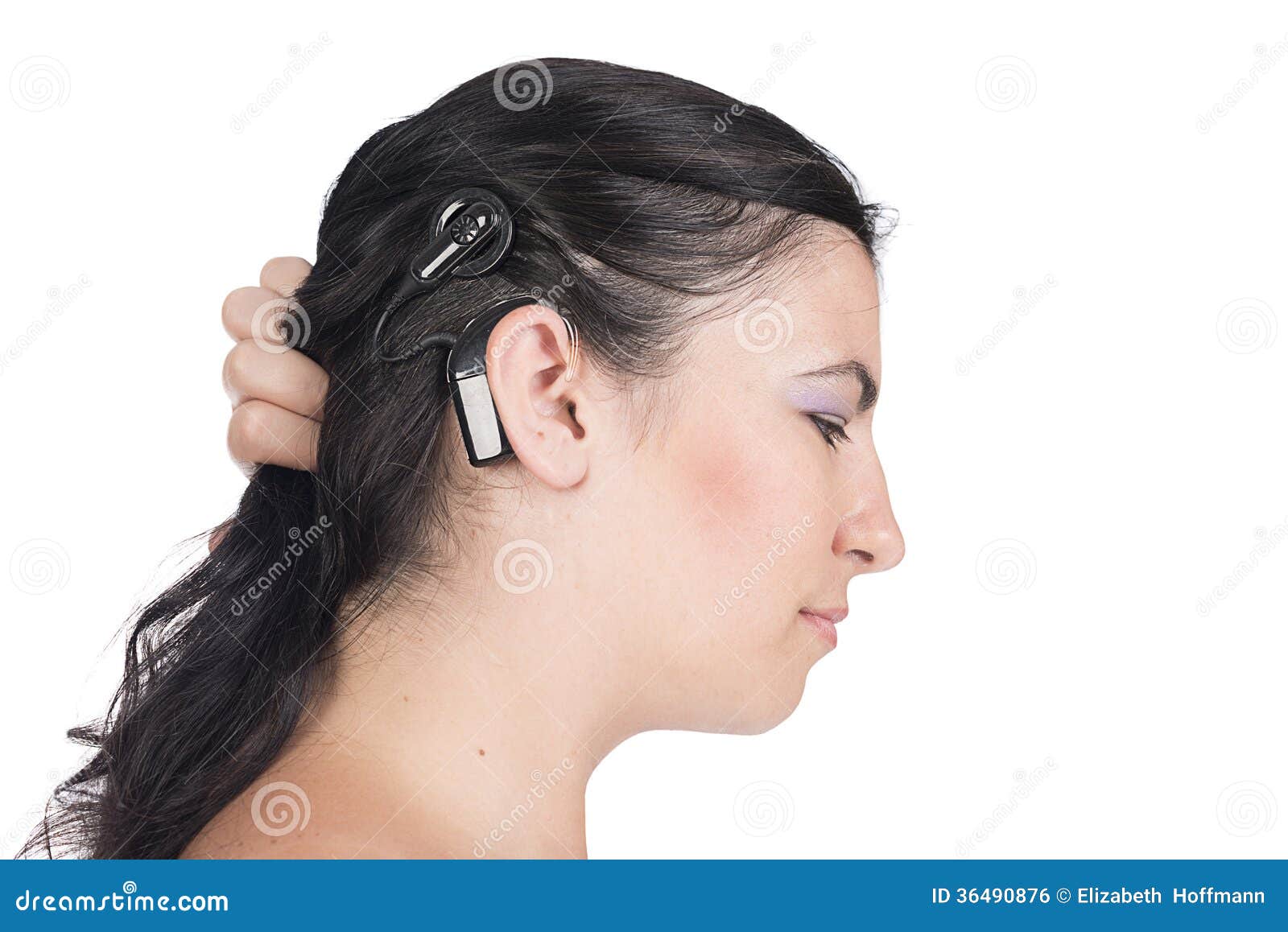 young deaf or hearing impaired woman with cochlear implant