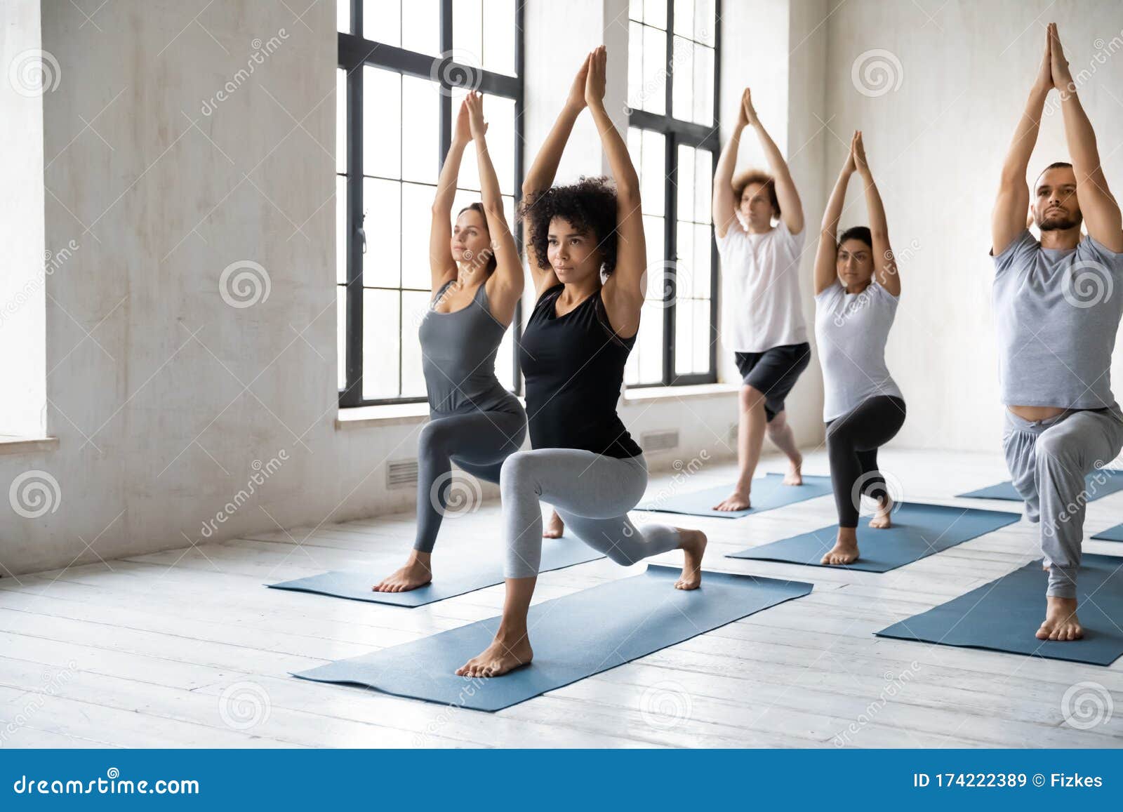 Two young women doing yoga handstand pose. Adho Mukha Vrksasana Stock Photo  - Alamy