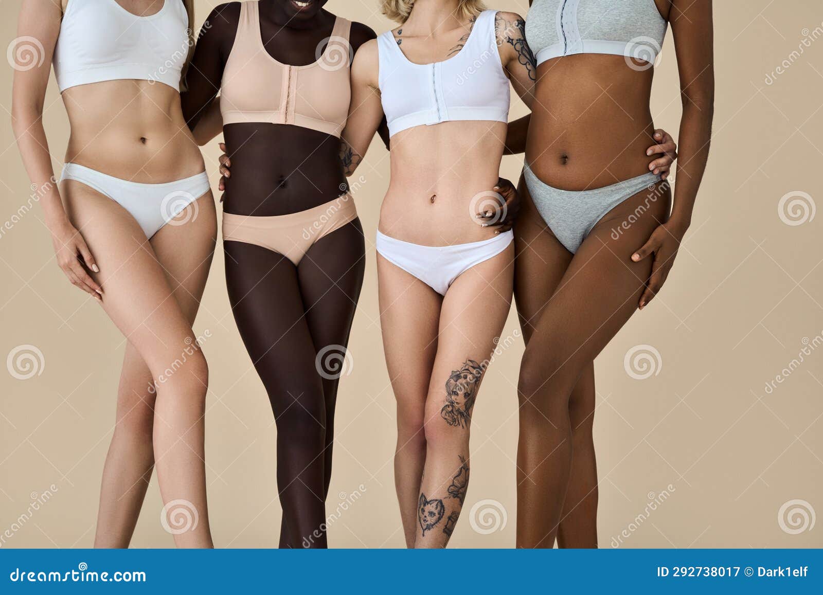 Young multicultural women bodies wear underwear on beige background, close  up. Stock Photo by insta_photos