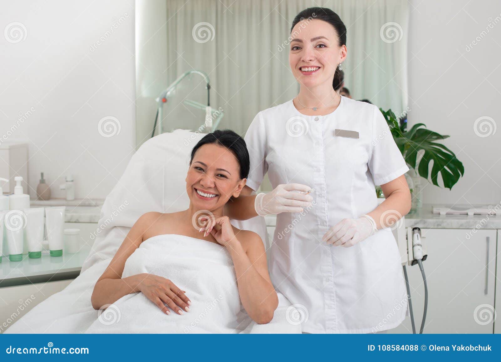 Glad Female Having Rest After Procedure In Beauty Salon Stock