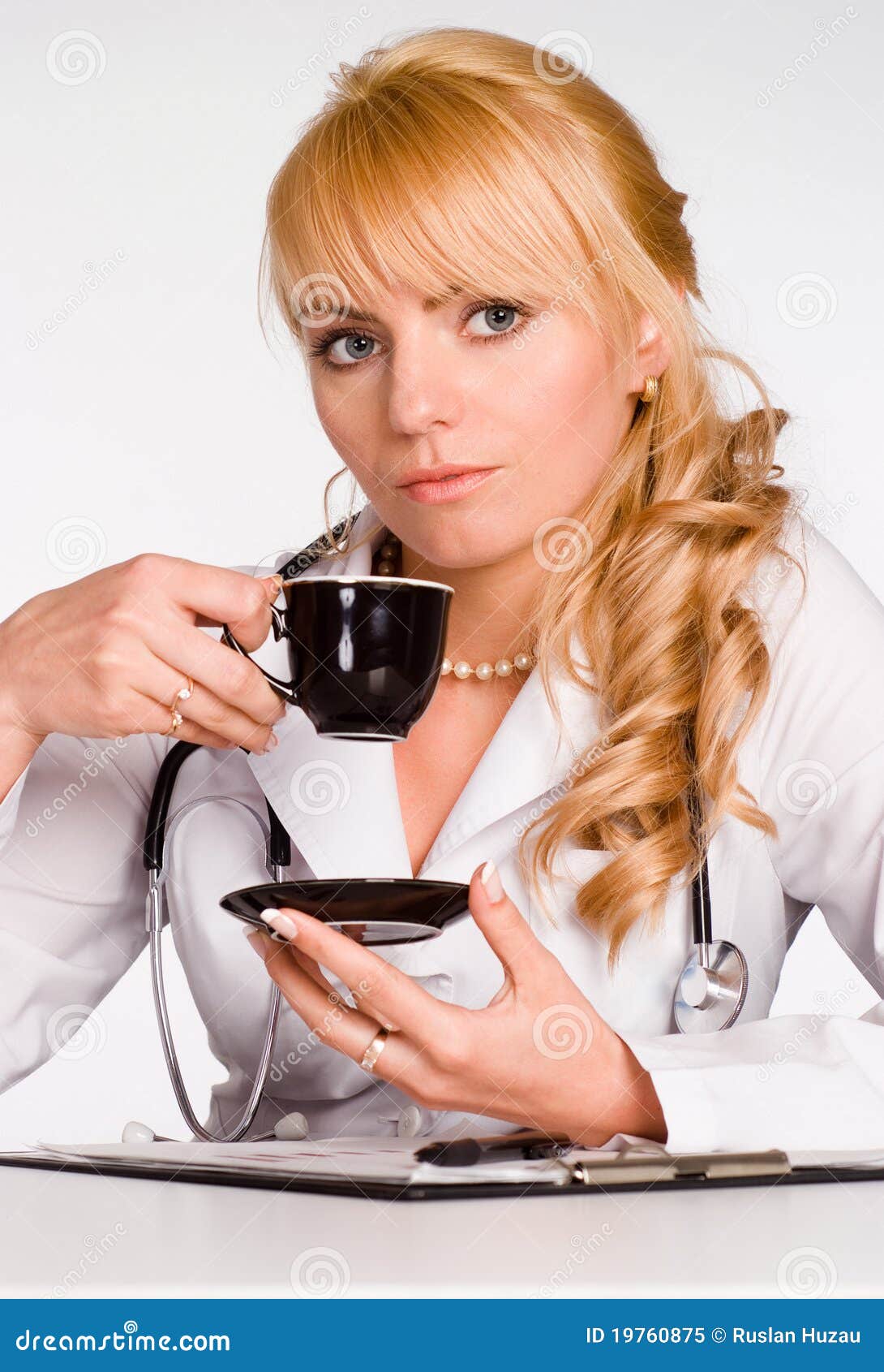 Young doctor drinks tea stock image. Image of lifestyle 19760875