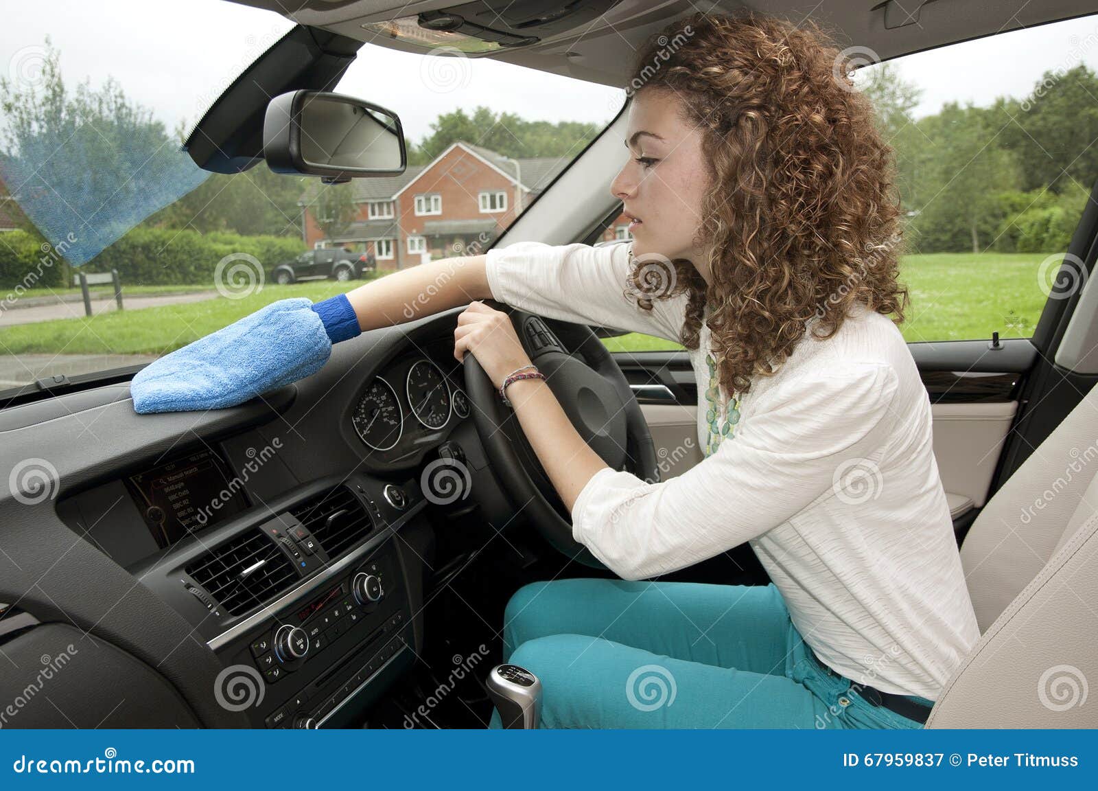Young Driver Dusting Car Interior Stock Image Image of teenager