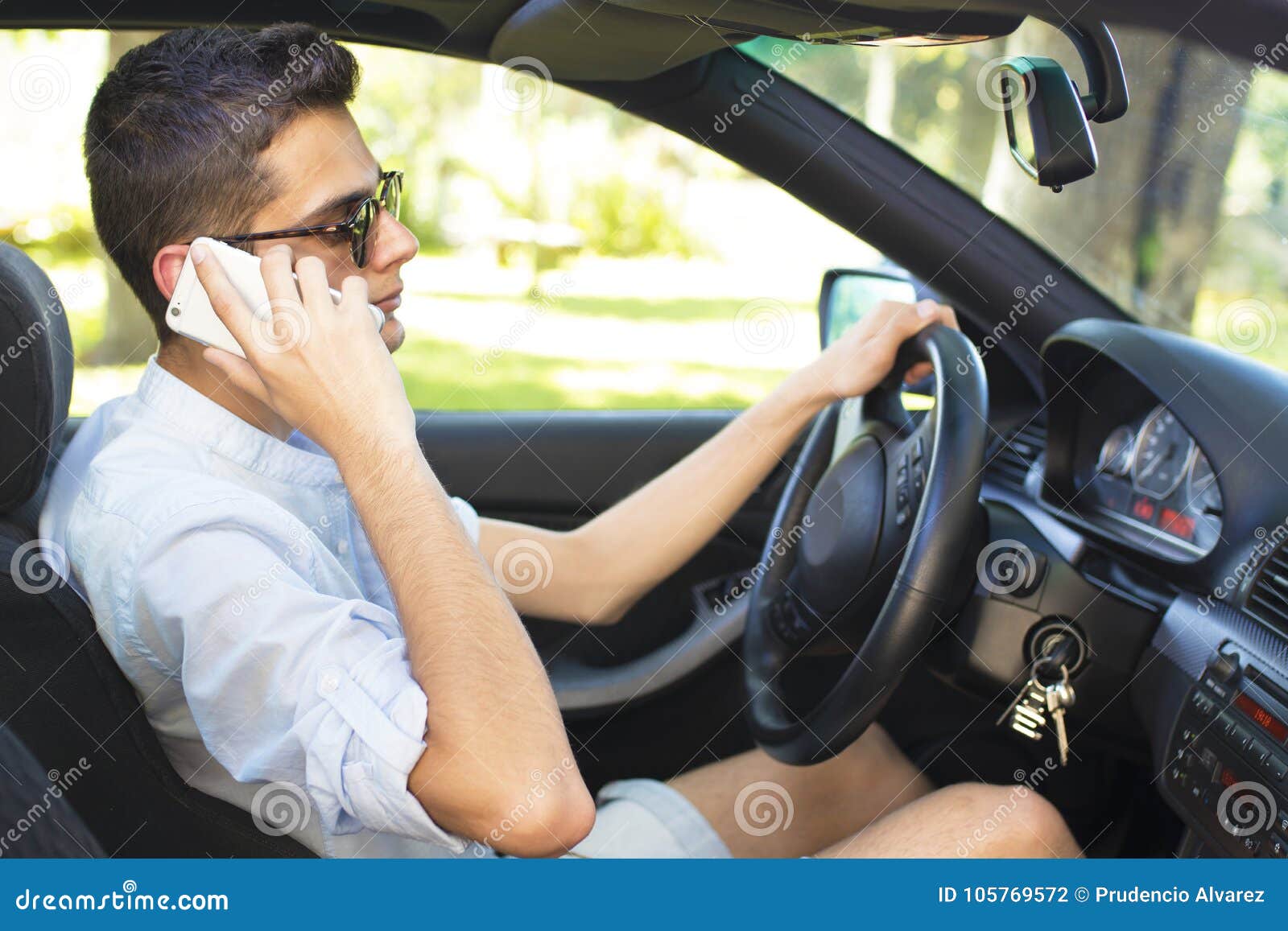 Young Driving Talking on Mobile Stock Photo Image of sitting