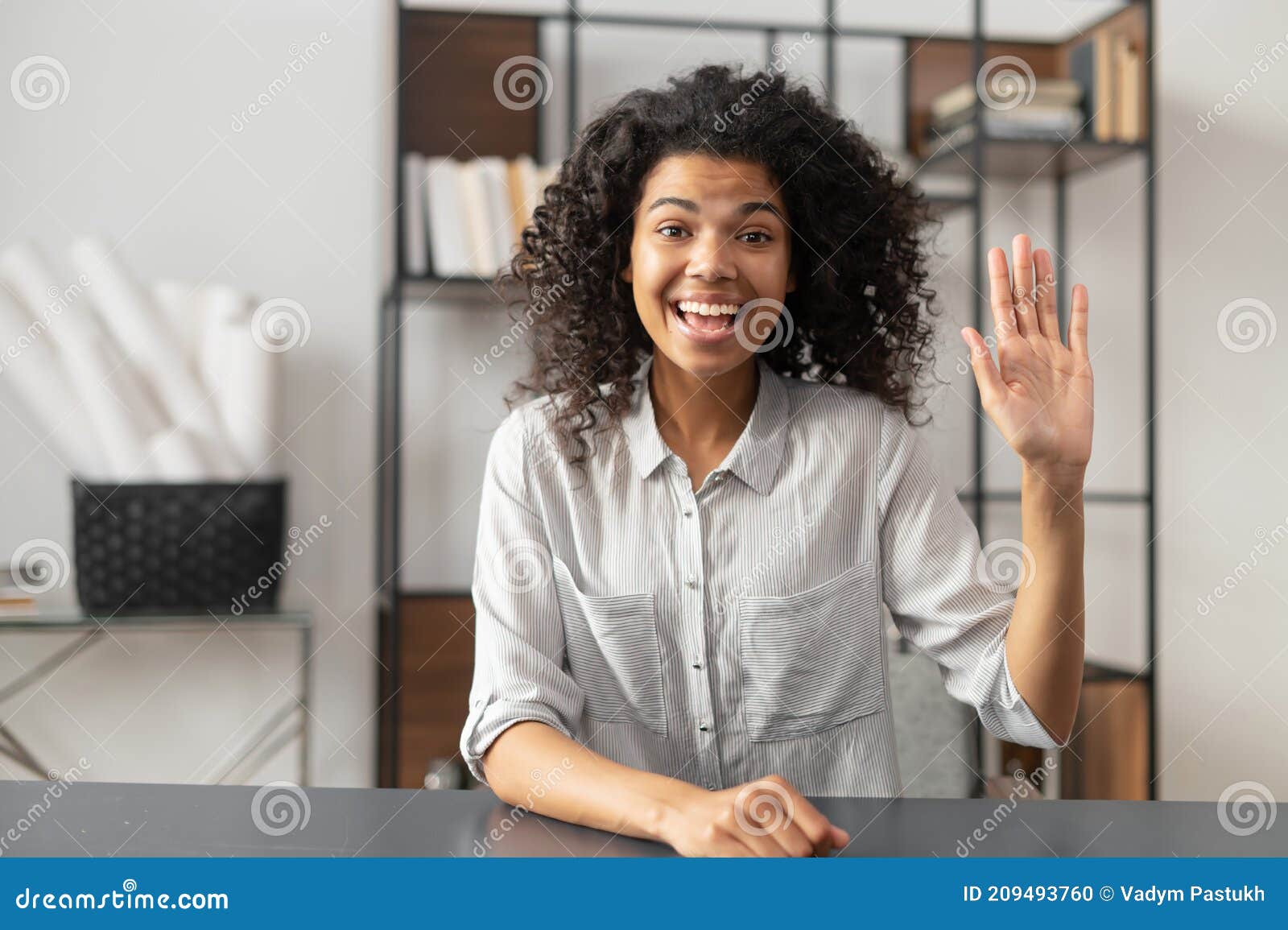 african-american woman saying hey on an interview