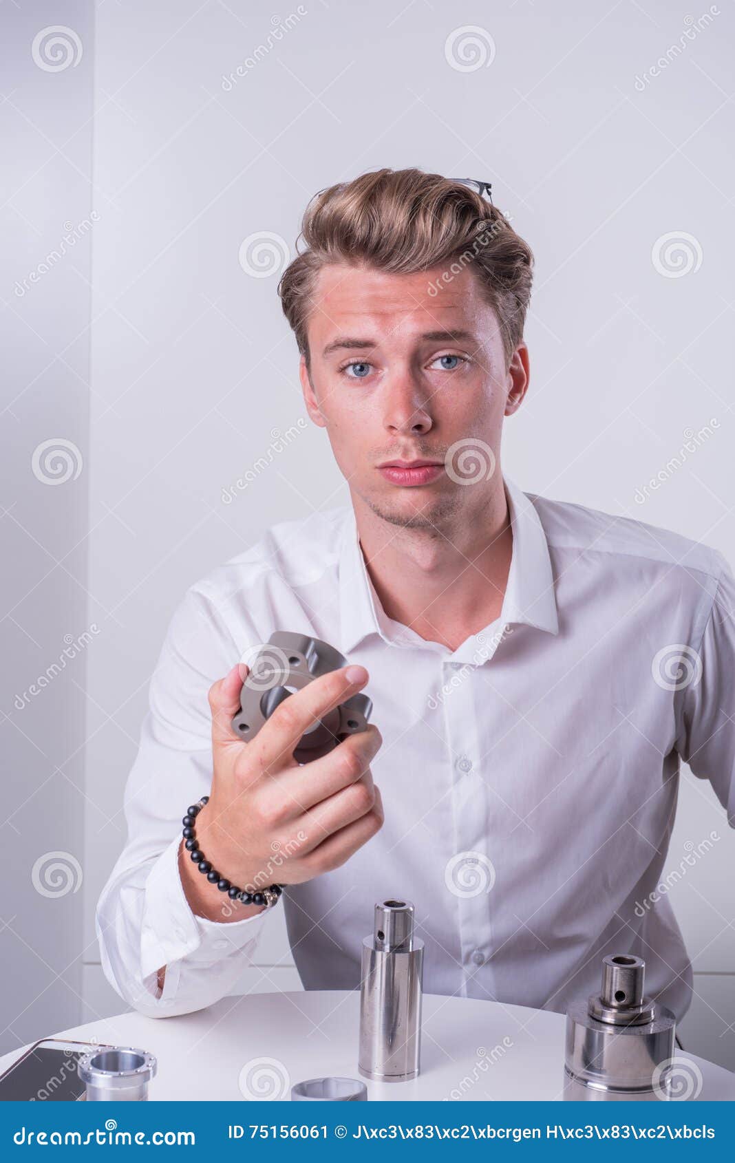 Young Engineer is Inspecting Machine Spare Parts Stock Image Image of