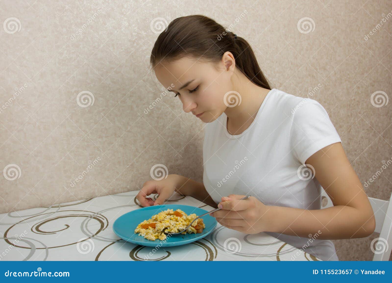 Young European Girl with Long Hair Eating Eggs Stock Image - Image of home,  food: 115523657