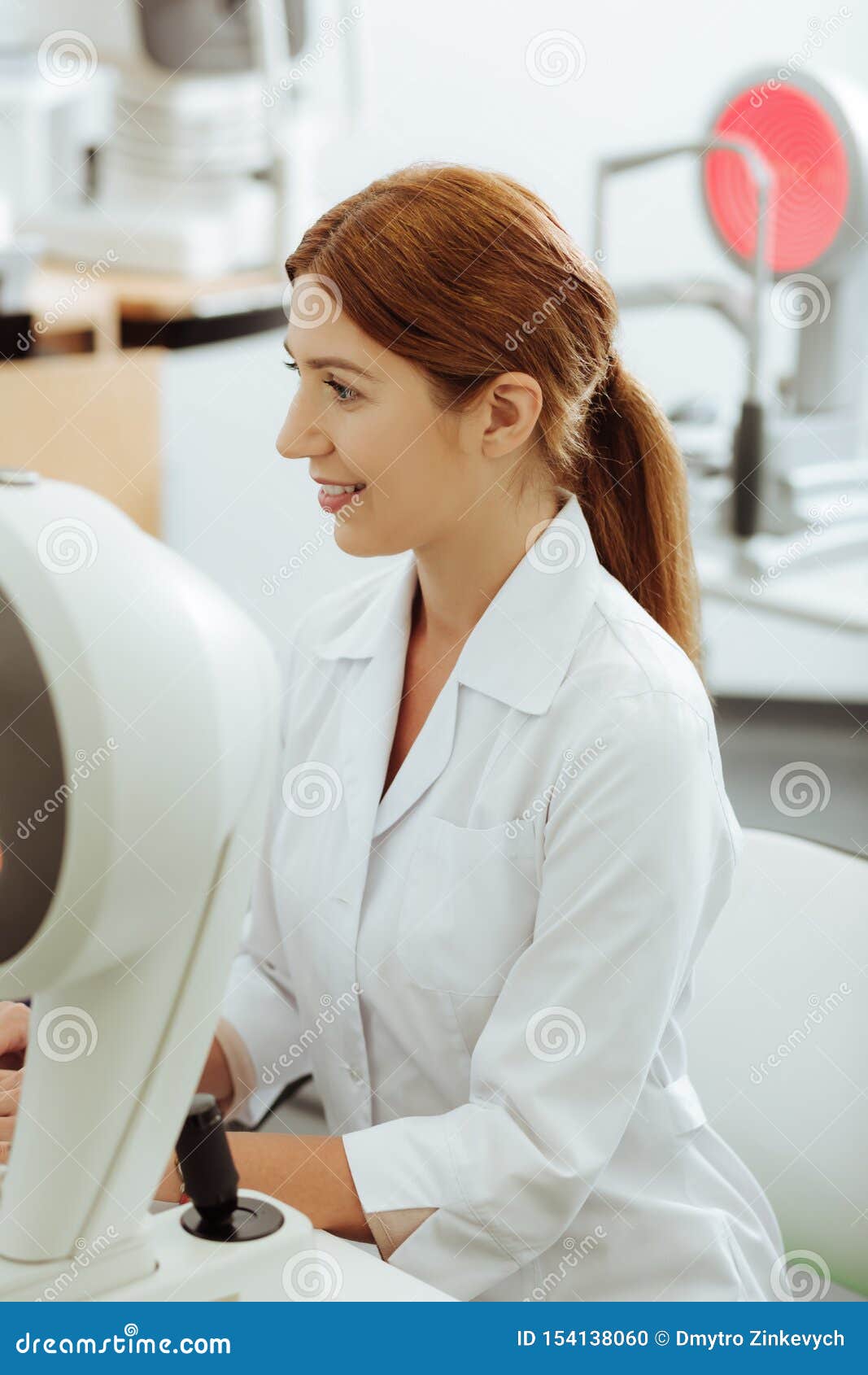 Young Eye Specialist Working and Enjoying Process Stock Photo Image
