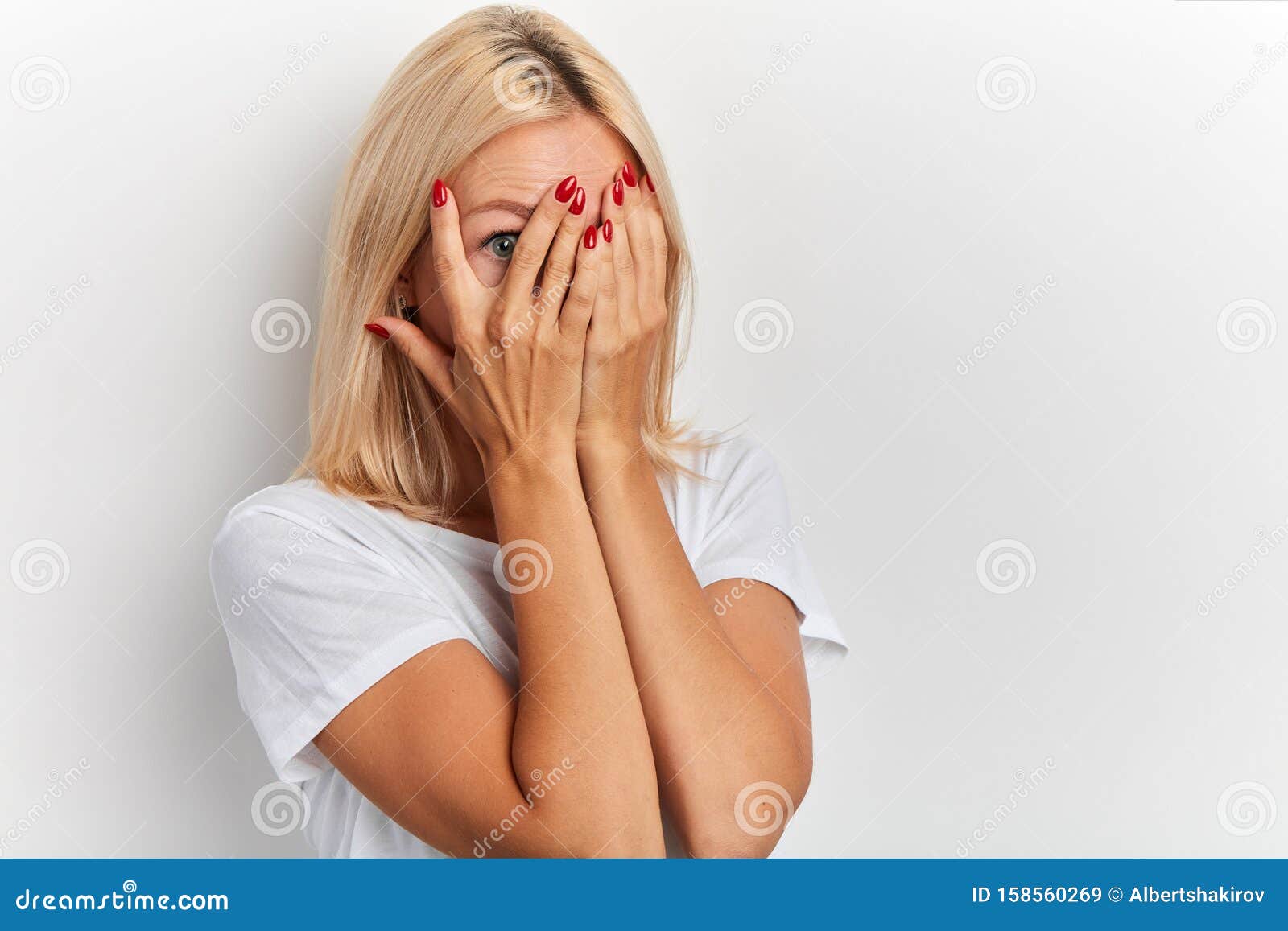 Young Fair-haired Girl Covering Face with Hands, Her Eyes Full of Terror  Stock Image - Image of embarrassment, frightened: 158560269
