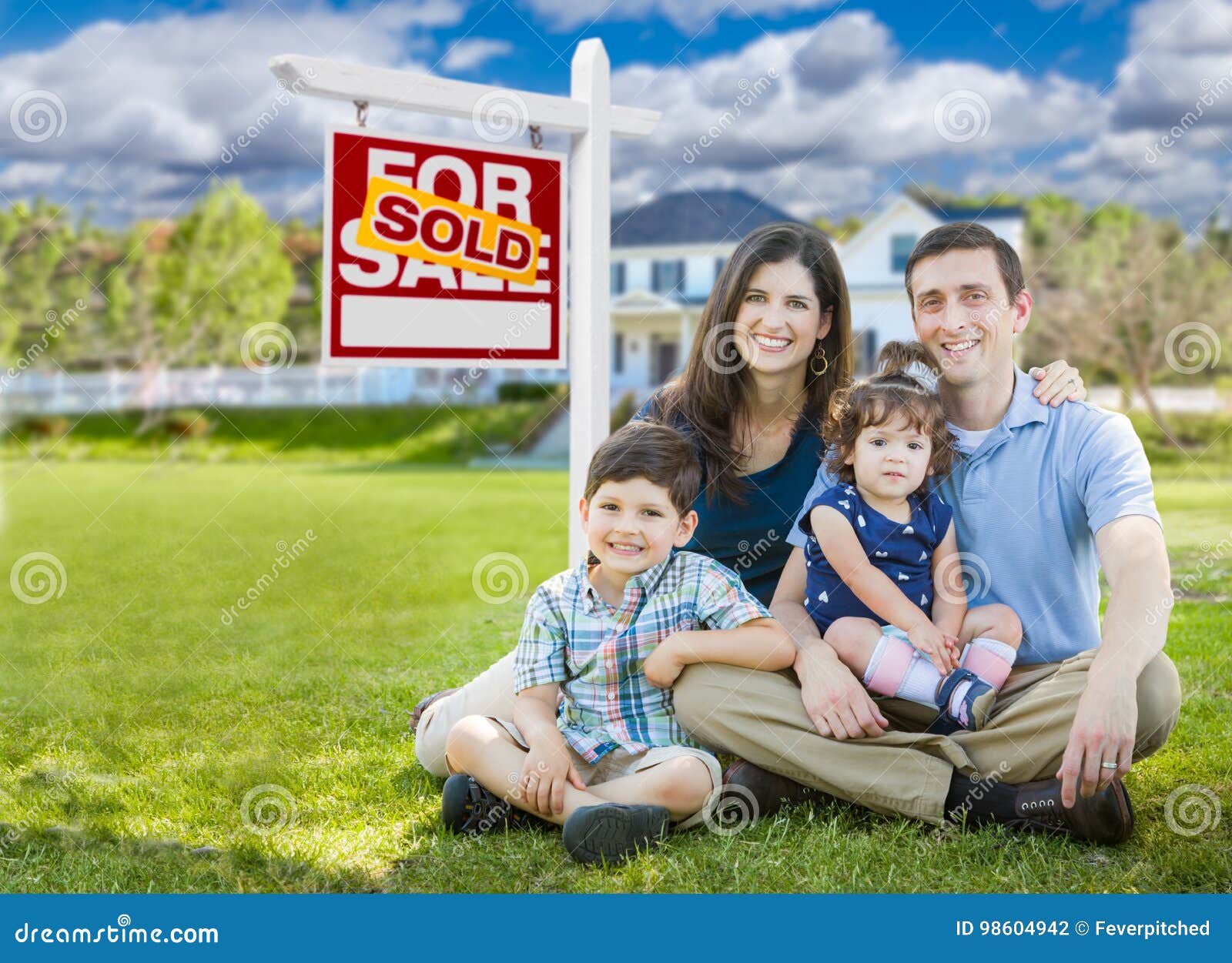 Young Family with Children in Front of Custom Home and Sold for Stock ...