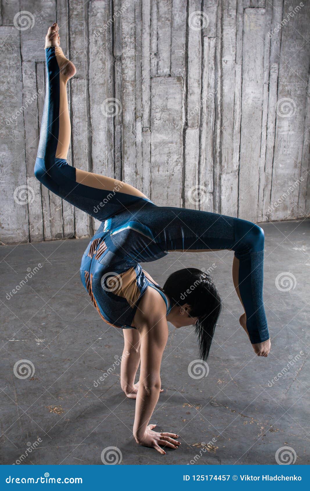 Circus Gymnast Woman Flexible Body Standing On Arms Upside Down Balancing Balls On Feet