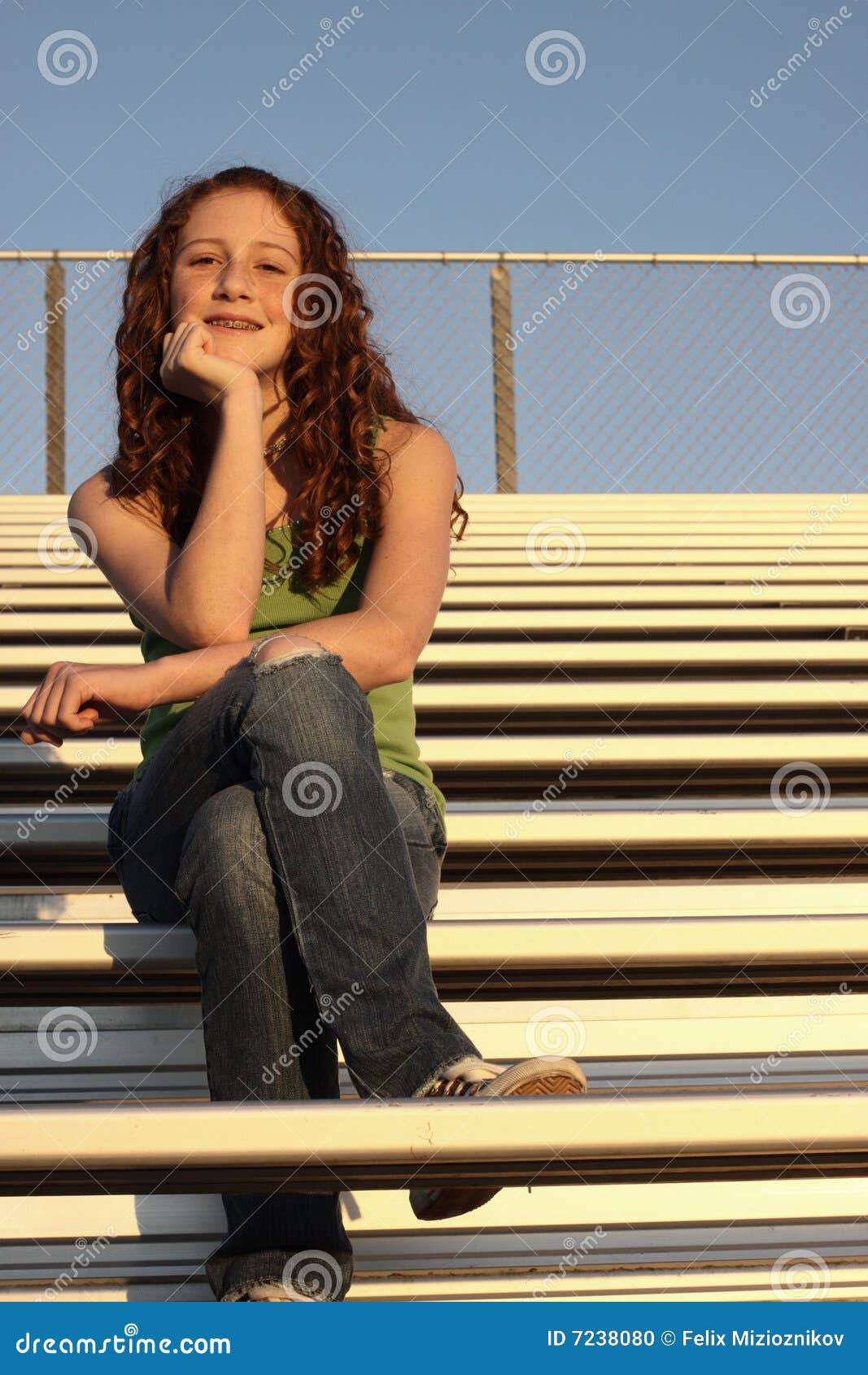 Young Female On Bleachers Stock Photo Image 7238080
