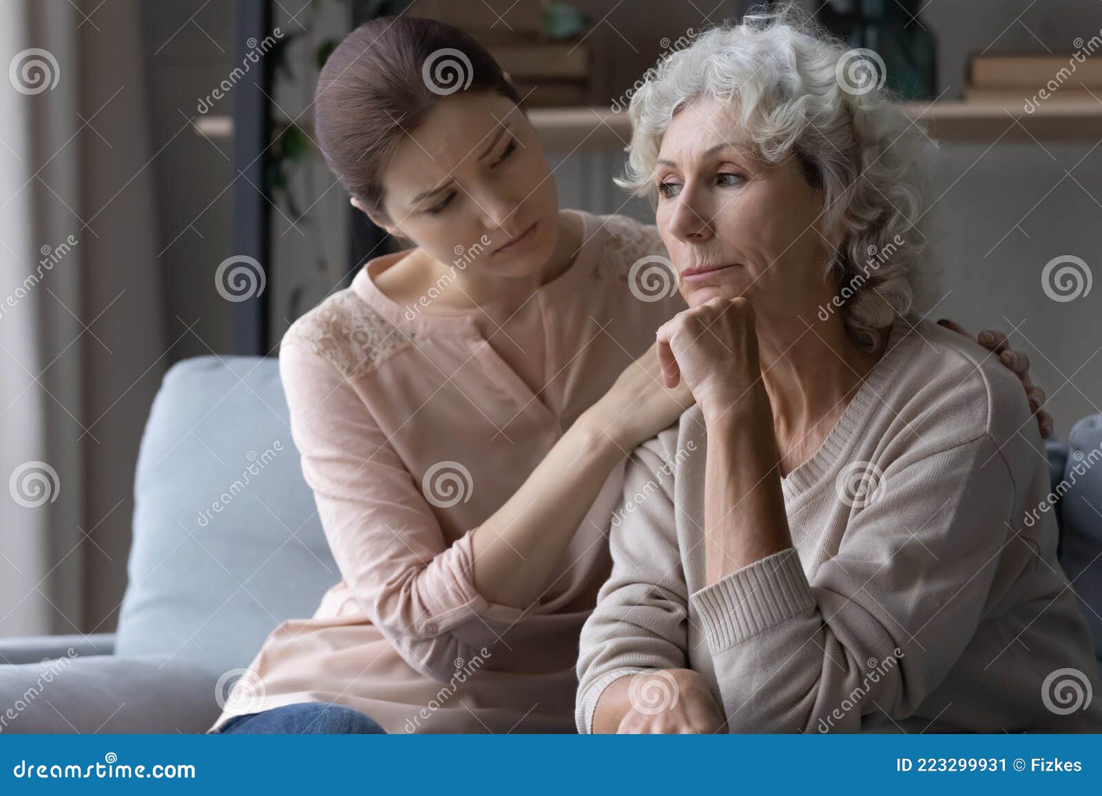 Young Female Caregiver Support Grieving Suffering Mature Old Woman Retiree Stock Image
