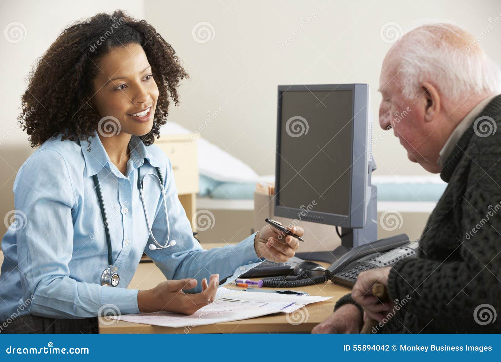 young female doctor with senior male patient