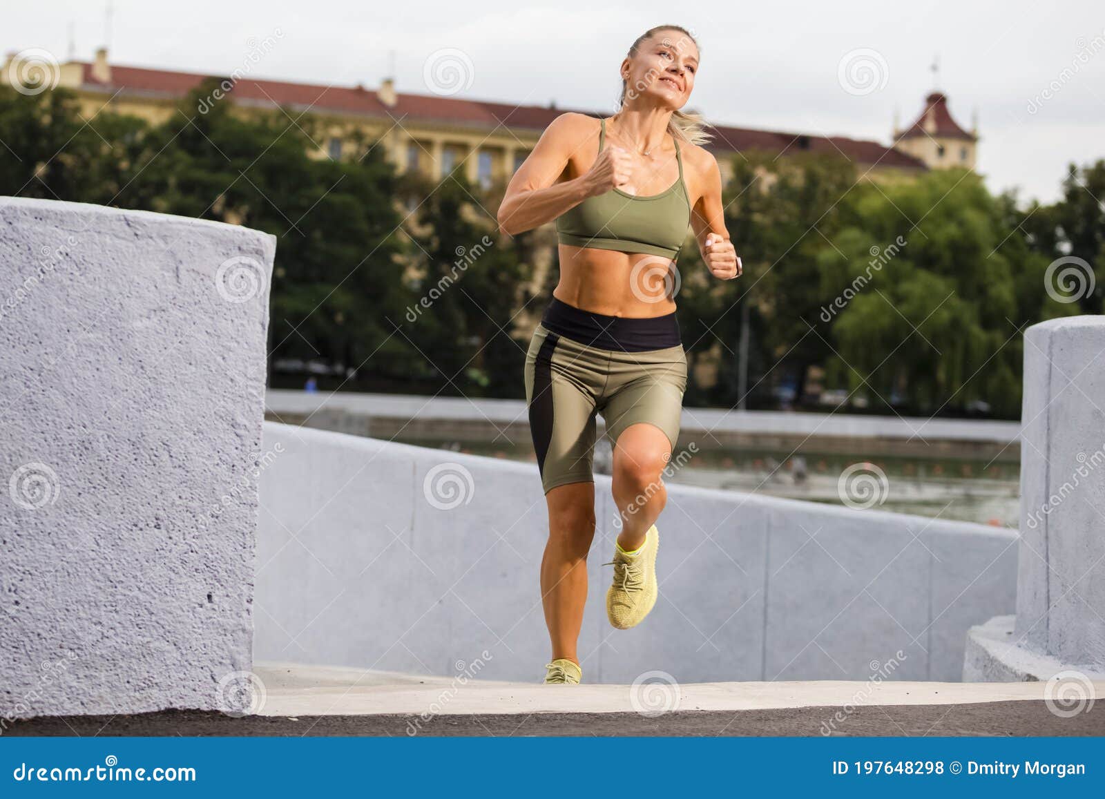 Young Female Runner in Jogging Outfit during Her Regular Training Exercises  Outdoors Stock Photo - Image of healthy, lifestyle: 197648298