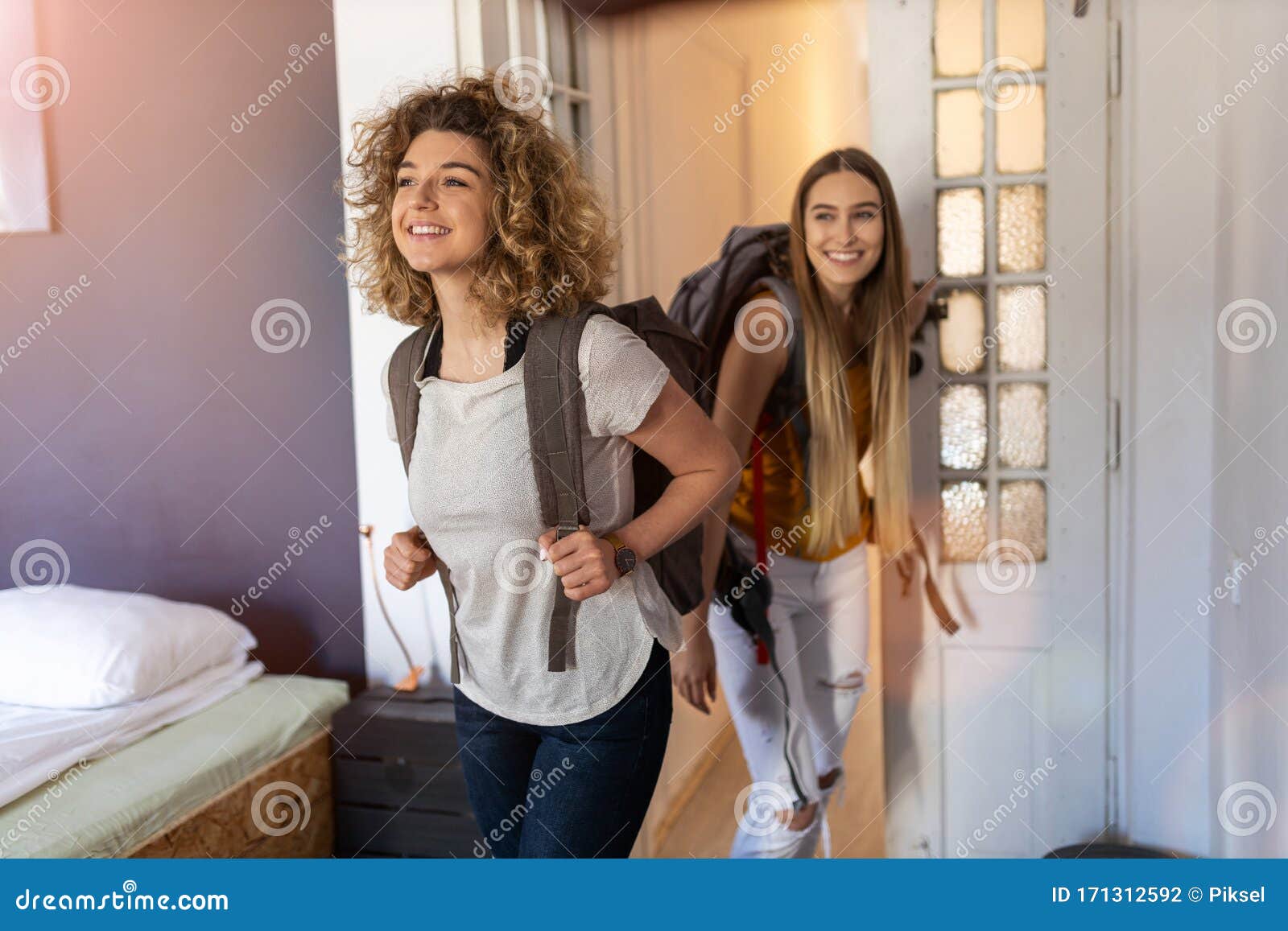 young female tourists staying in youth hostel