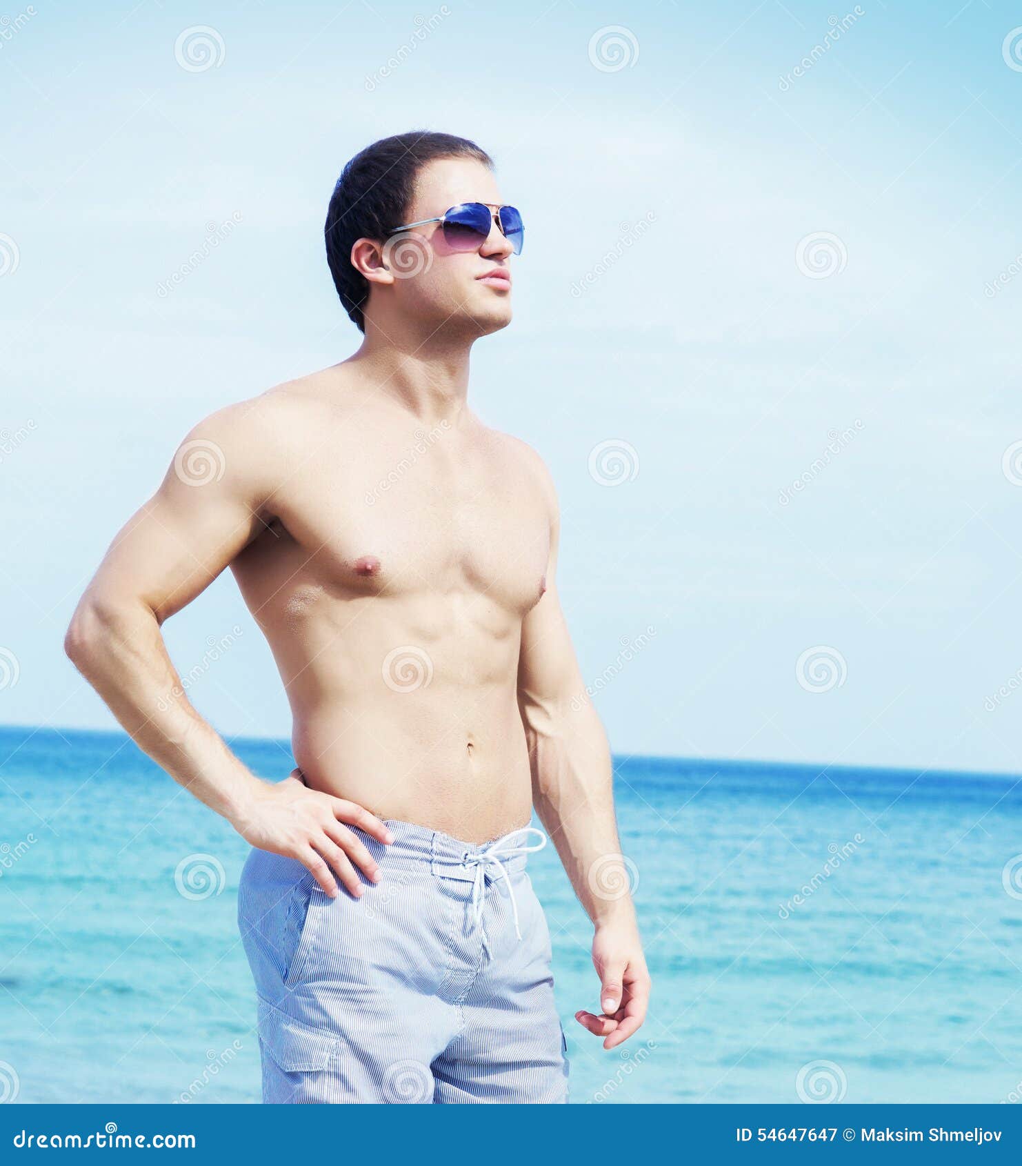 Young and Fit Man on the Beach Stock Image - Image of caucasian ...