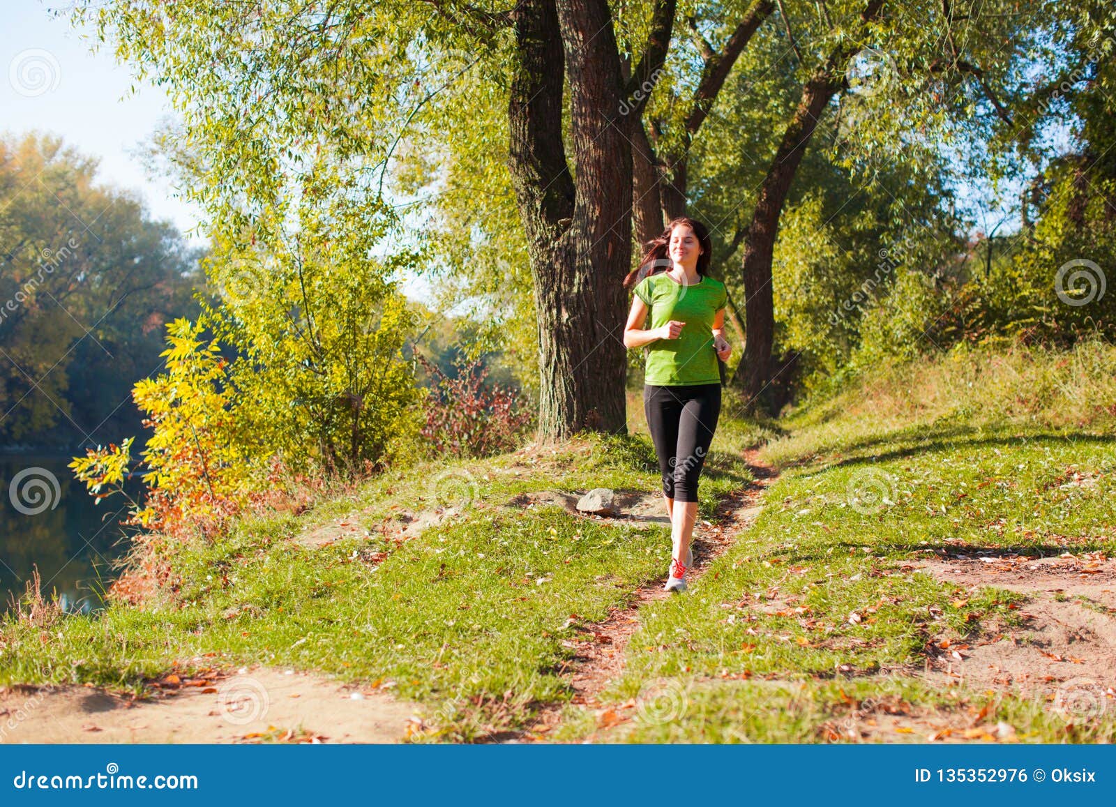 Young Fit Sport Model Running through the Forest Stock Photo - Image of ...