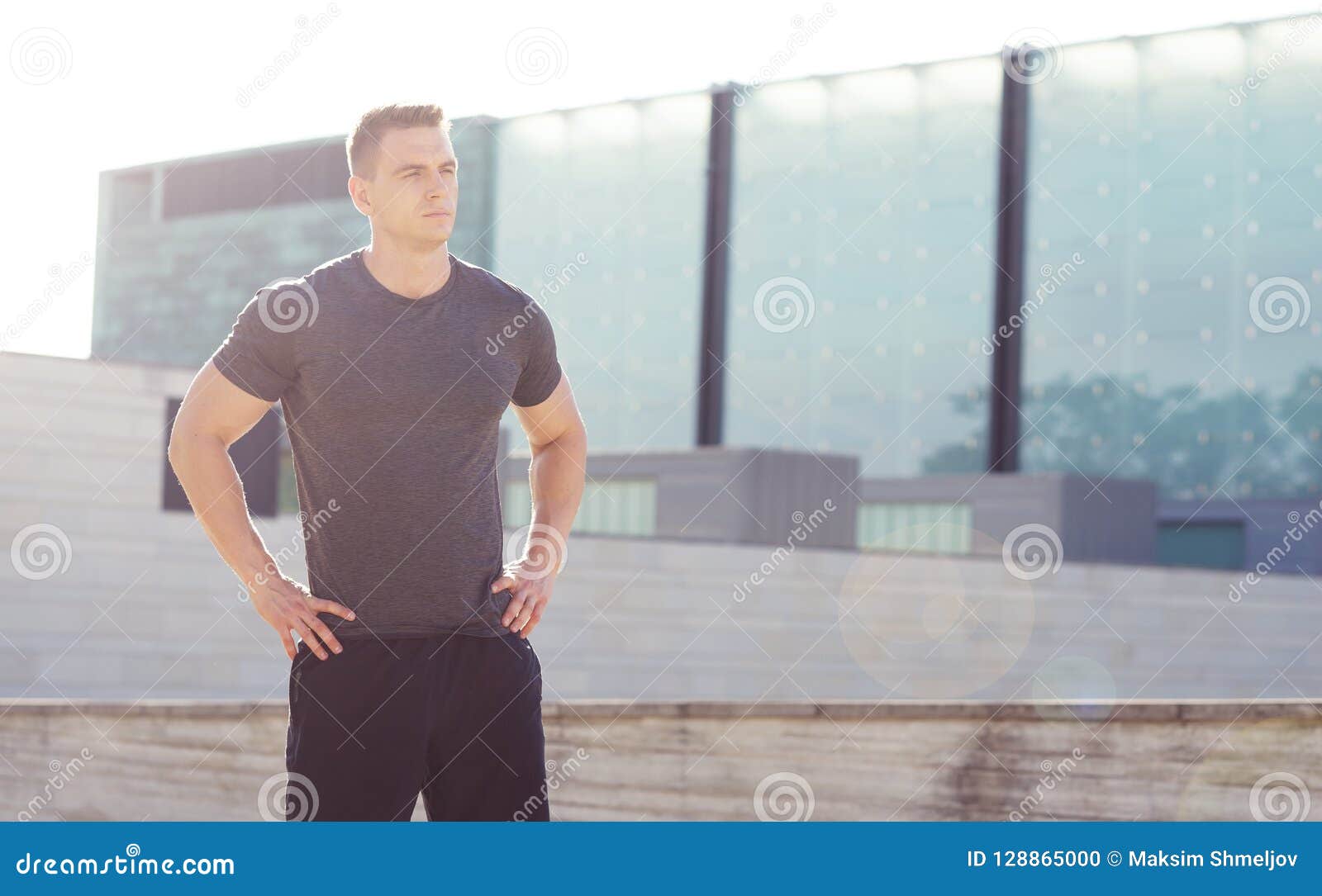 Young and Strong Guy Training Outdoor in Sportswear. Man in a Light of ...