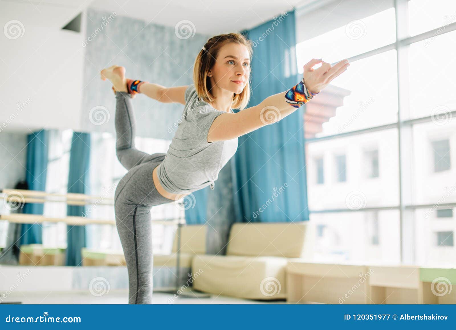 Young Fit Woman Doing a Yoga Pose Standing with One Leg Raised Up. Stock  Image - Image of portrait, caucasian: 120351977