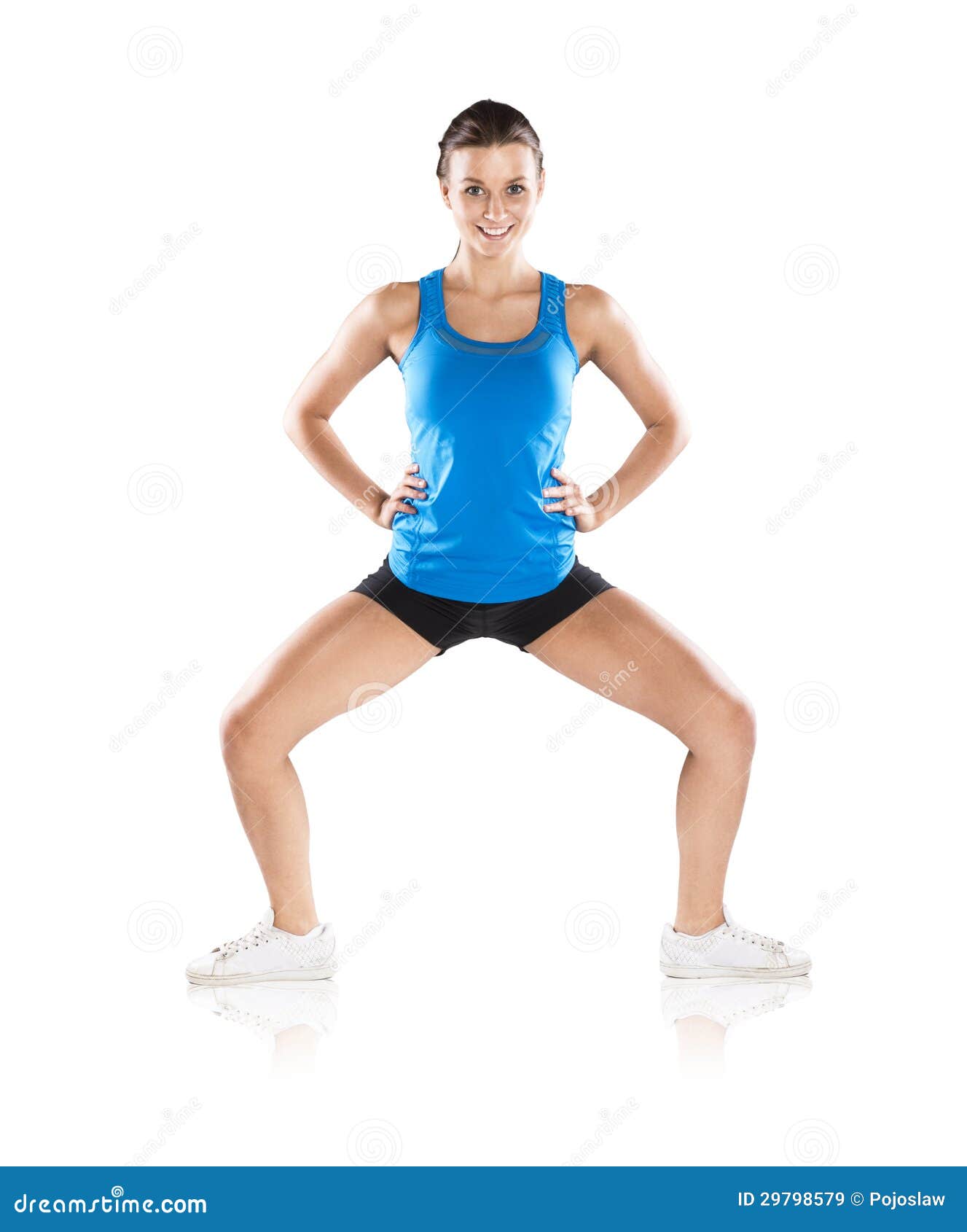 Fitness portrait. Young fitness model is posing in studio