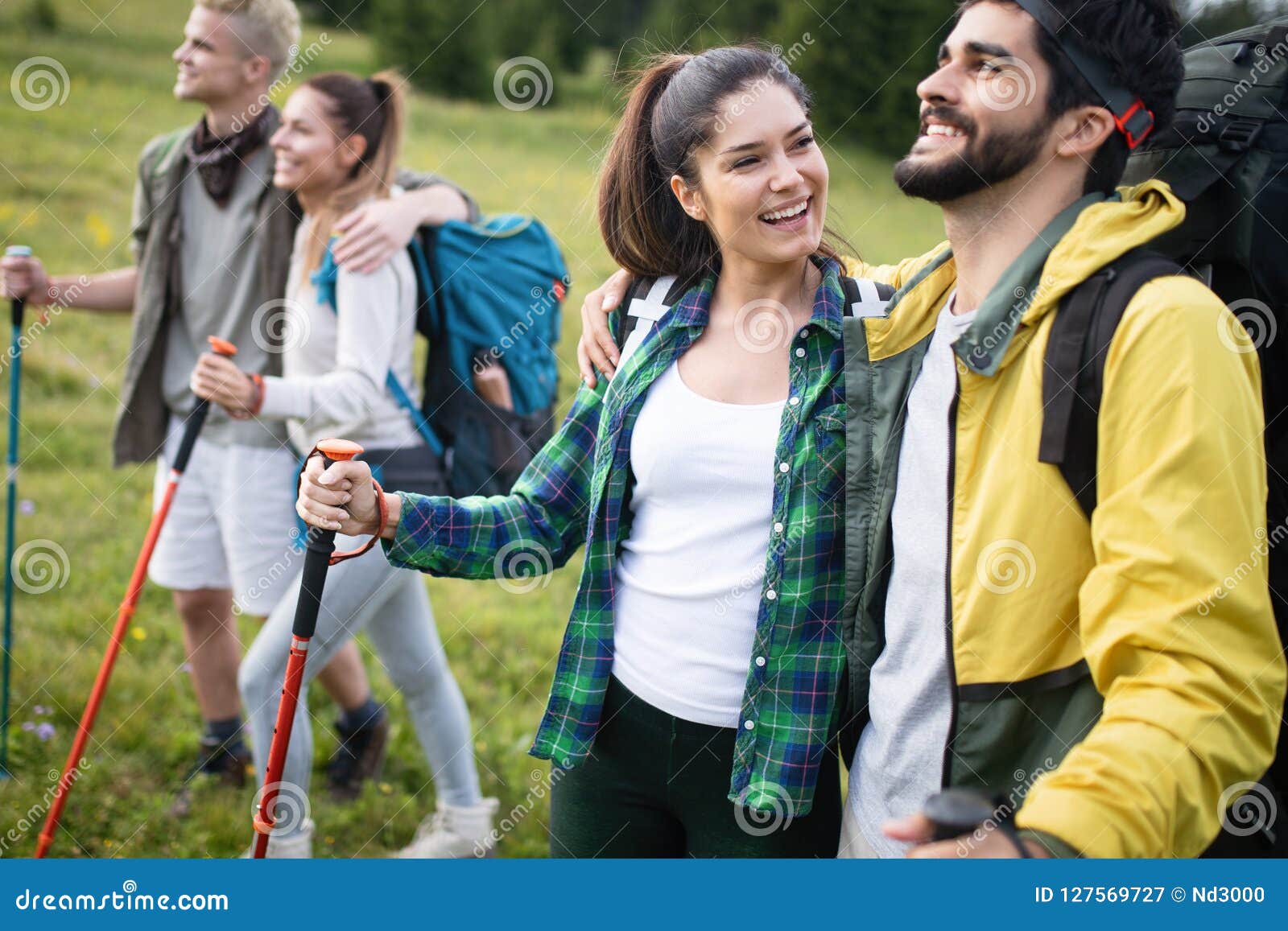 Young Friends on a Country Walk. Group of People Hiking through ...