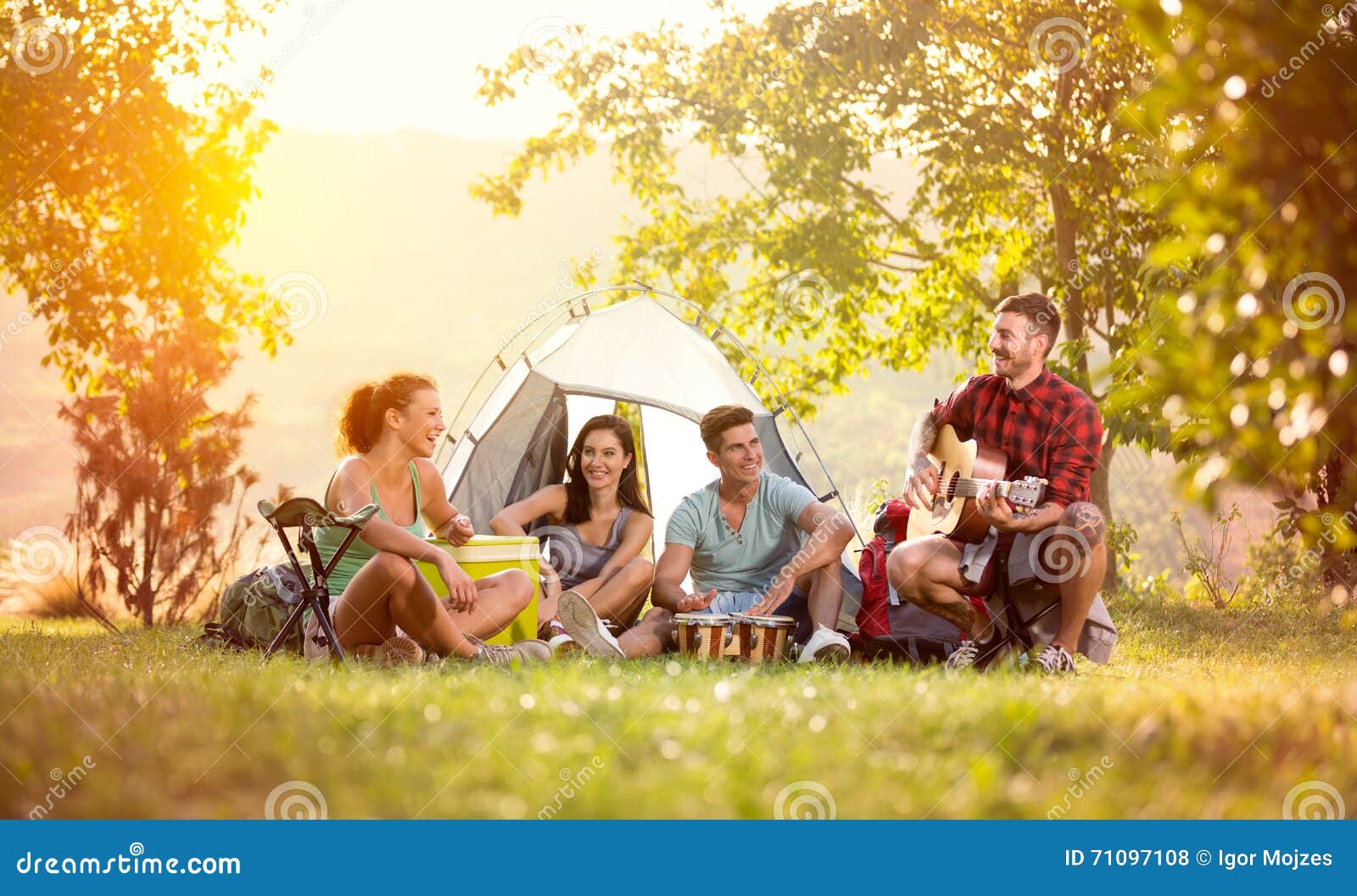 young friends have good time on camping trip