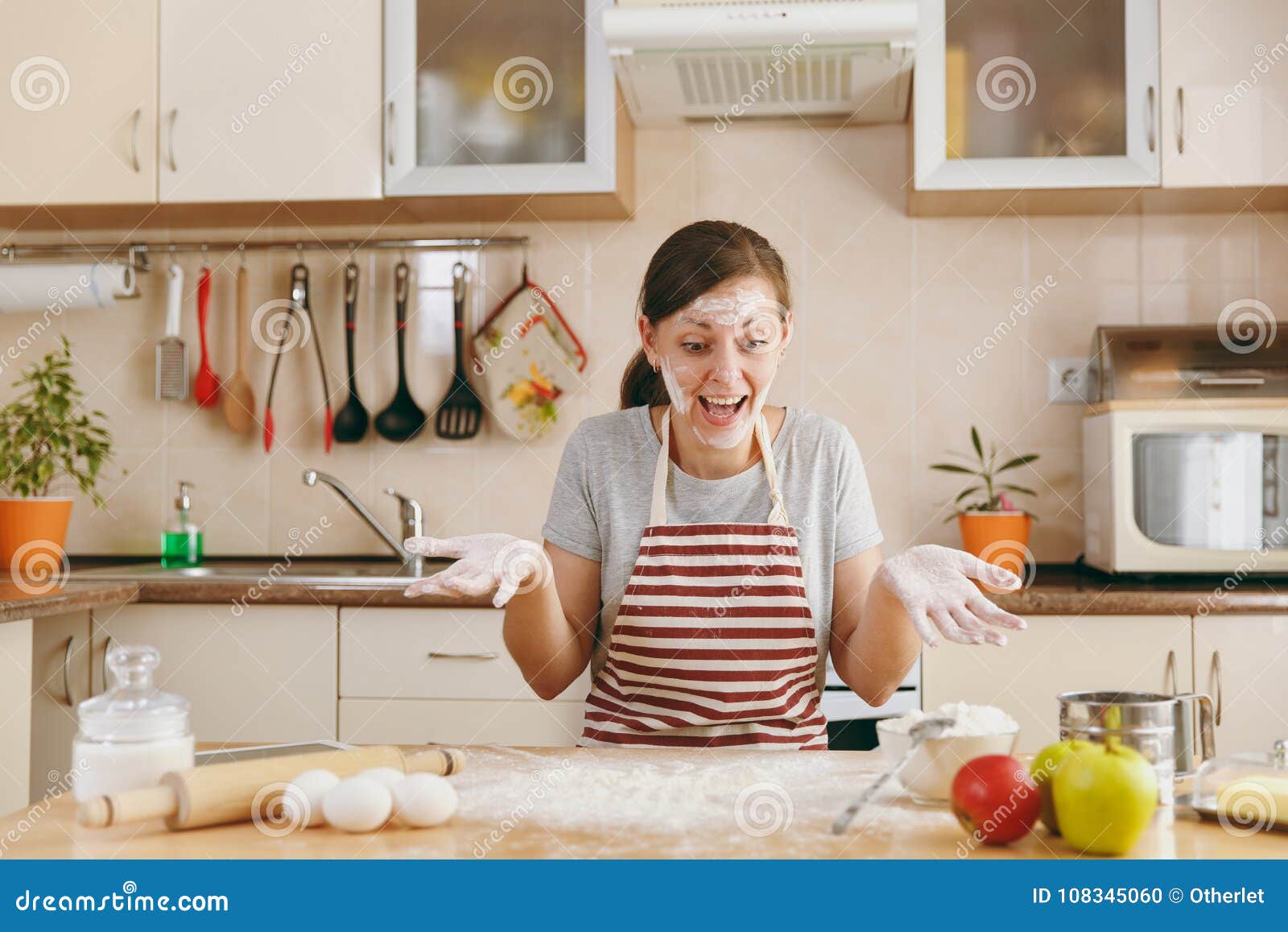 Young Beautiful Woman Is Cooking In The Kitchen Stock Photo Image Of
