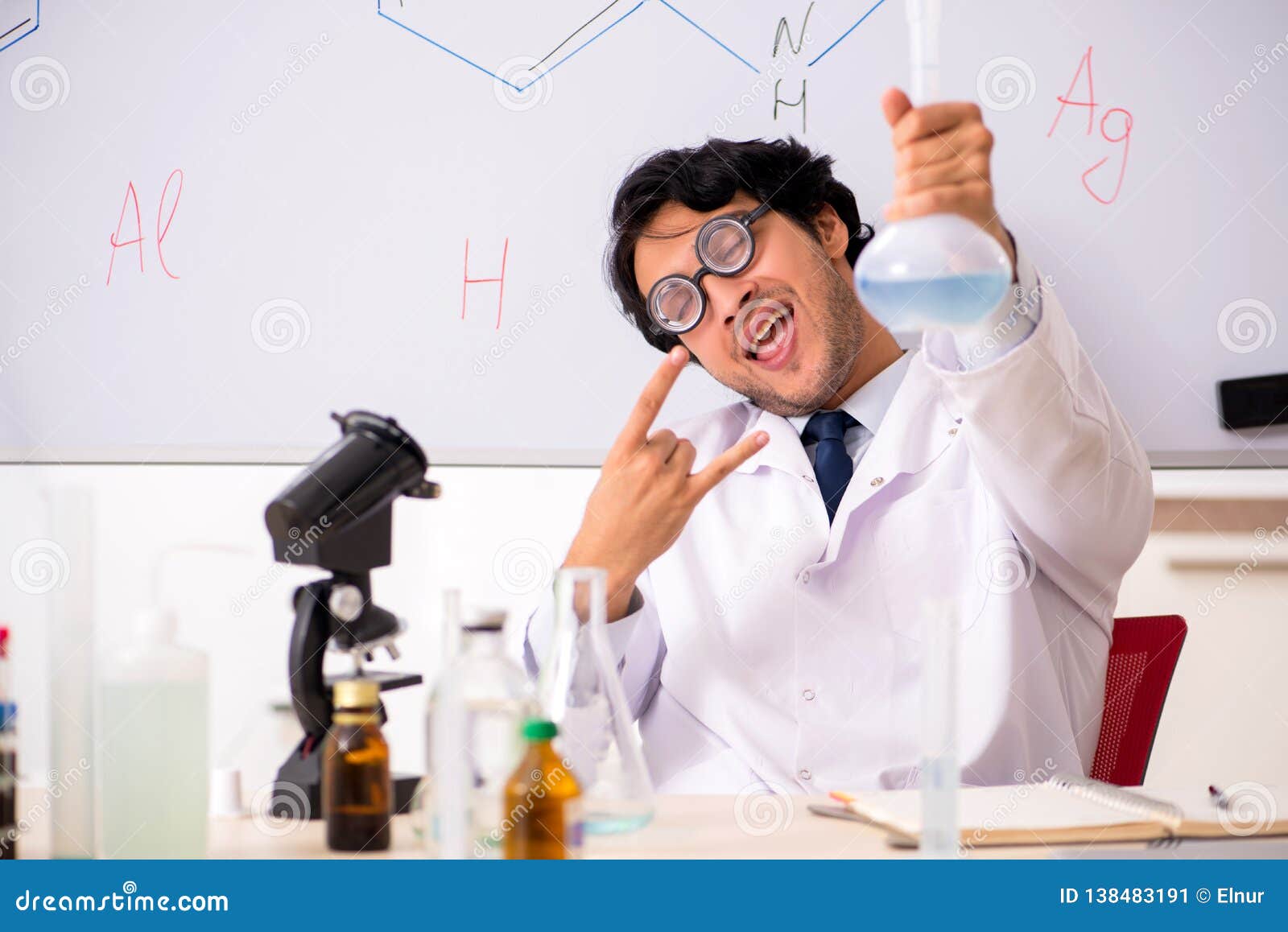 The Young Funny Chemist in Front of White Board Stock Image ...