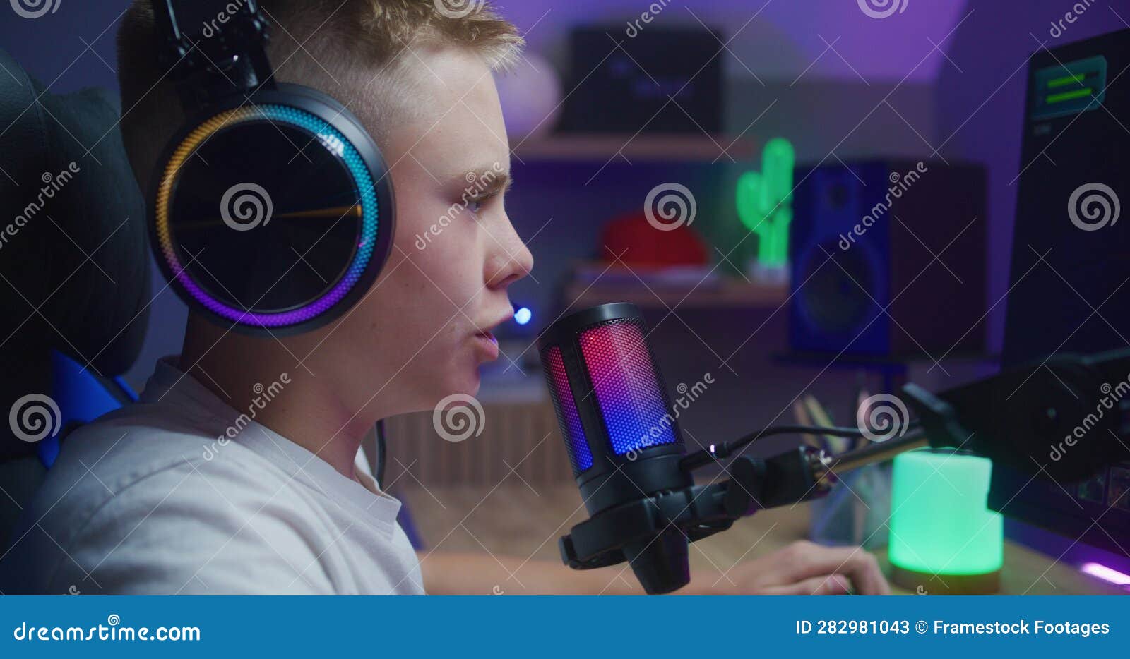 Young Gamer Plays in Third Person Shooter at Home Stock Image