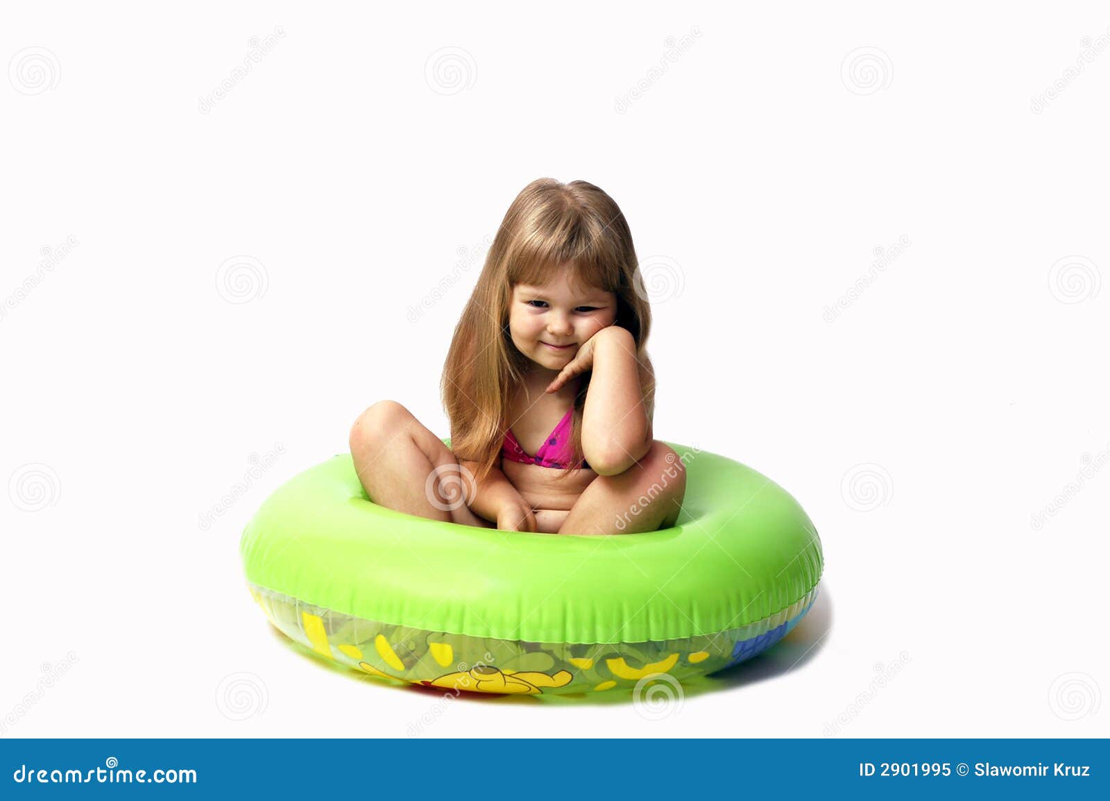 Young girl with green buoy on white background