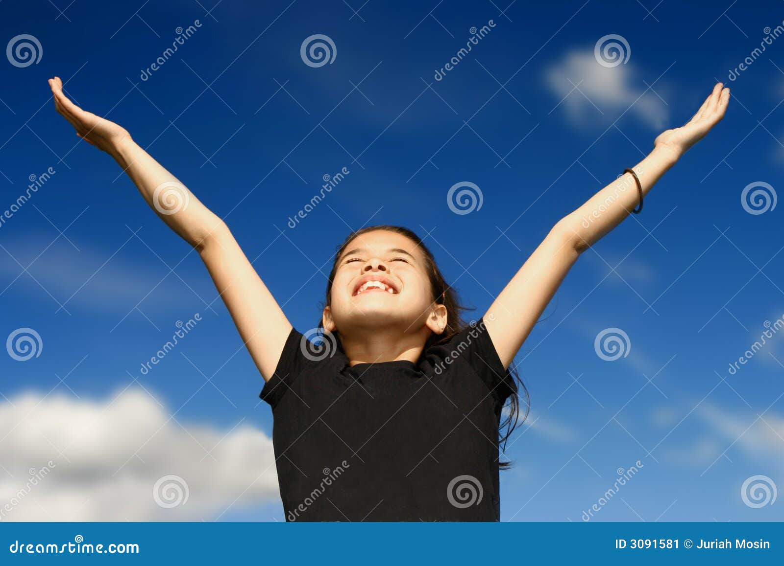 young girl arms wide open