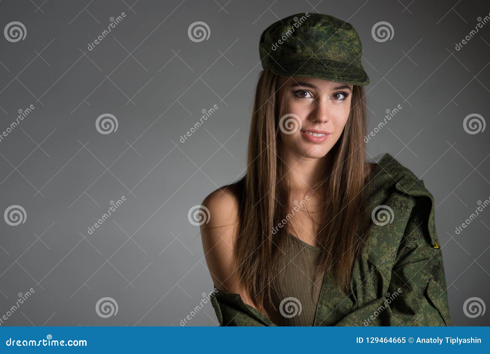 Young girl in army uniform stock image. Image of camouflage 129464665