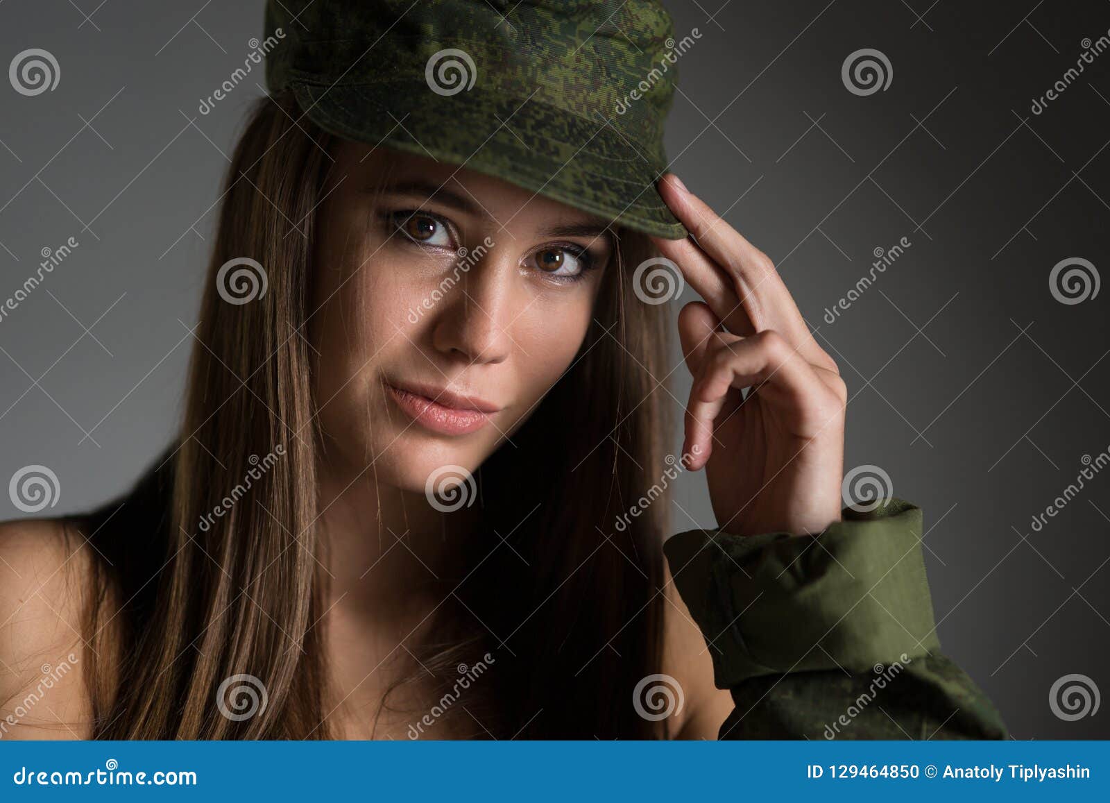 Young girl in army uniform stock photo. Image of camouflage 129464850