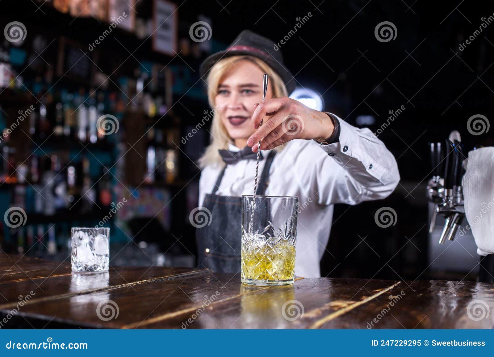 Young Girl Barkeeper Makes a Show Creating a Cocktail in Cocktail Bars ...