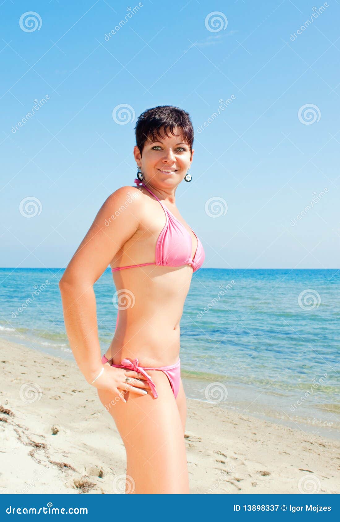 Young Teens In Bikinis At Beach