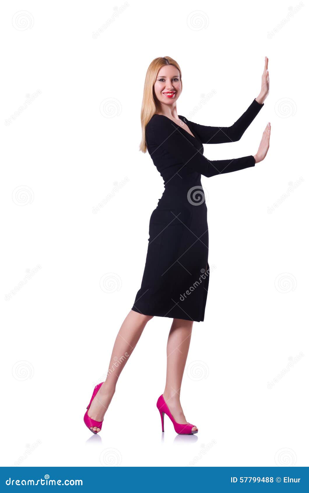 Young Girl in Black Dress Pushing Isolated on Stock Photo - Image of ...