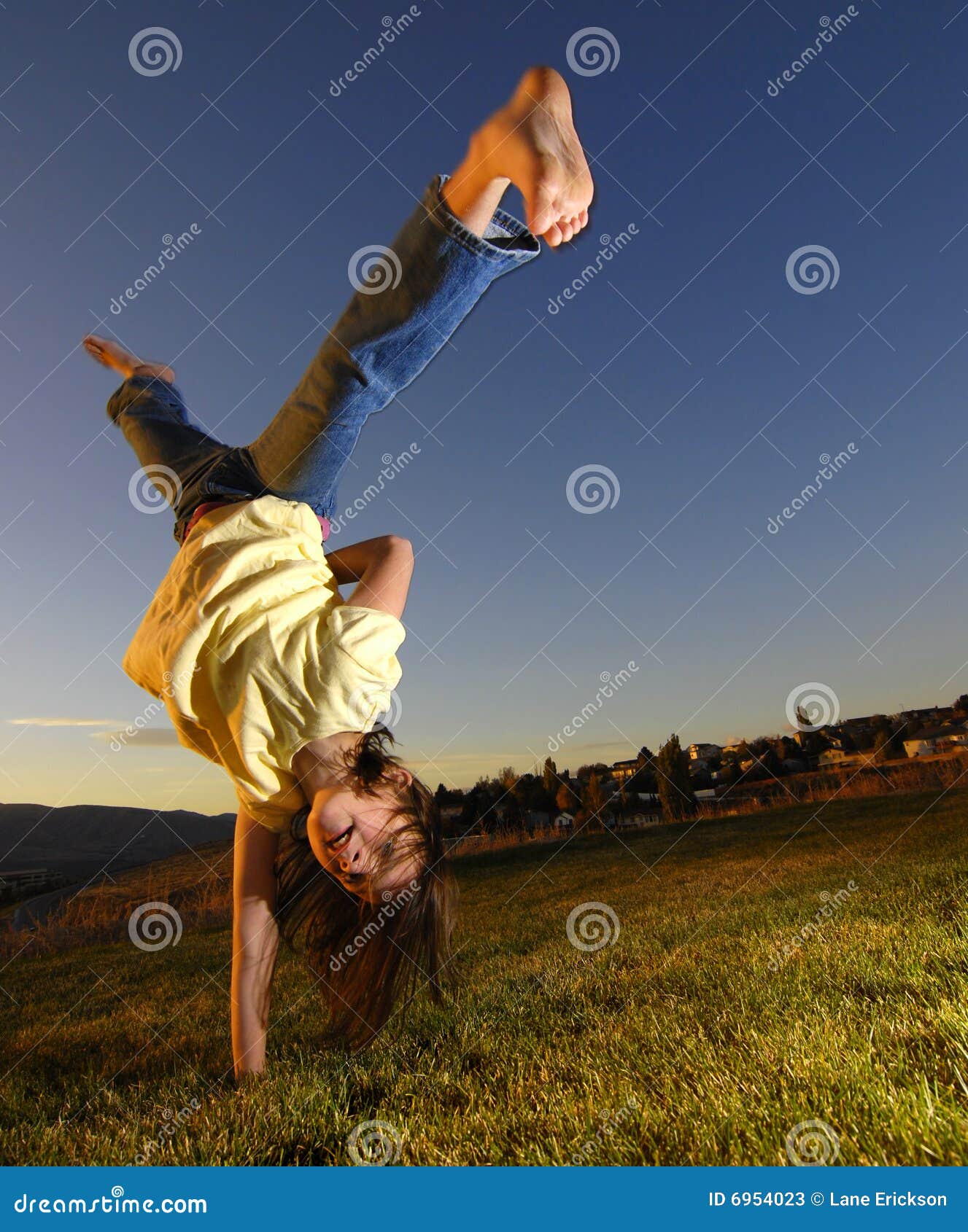 Young Girl Cartwheel stock image. Image of park, cartwheel 6954023