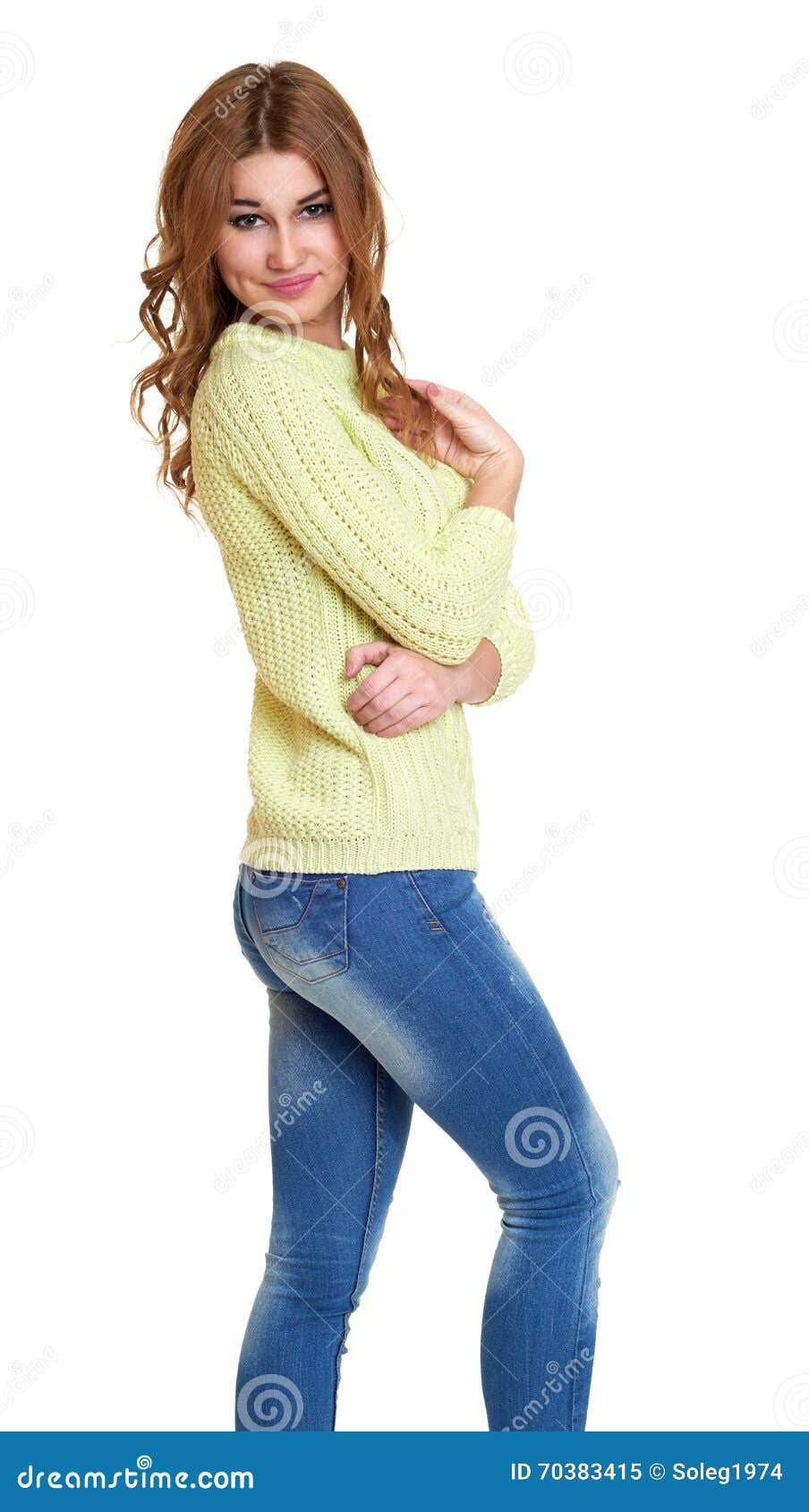 Young Girl Casual Dressed Blue Jeans and a Green Sweater Posing in ...