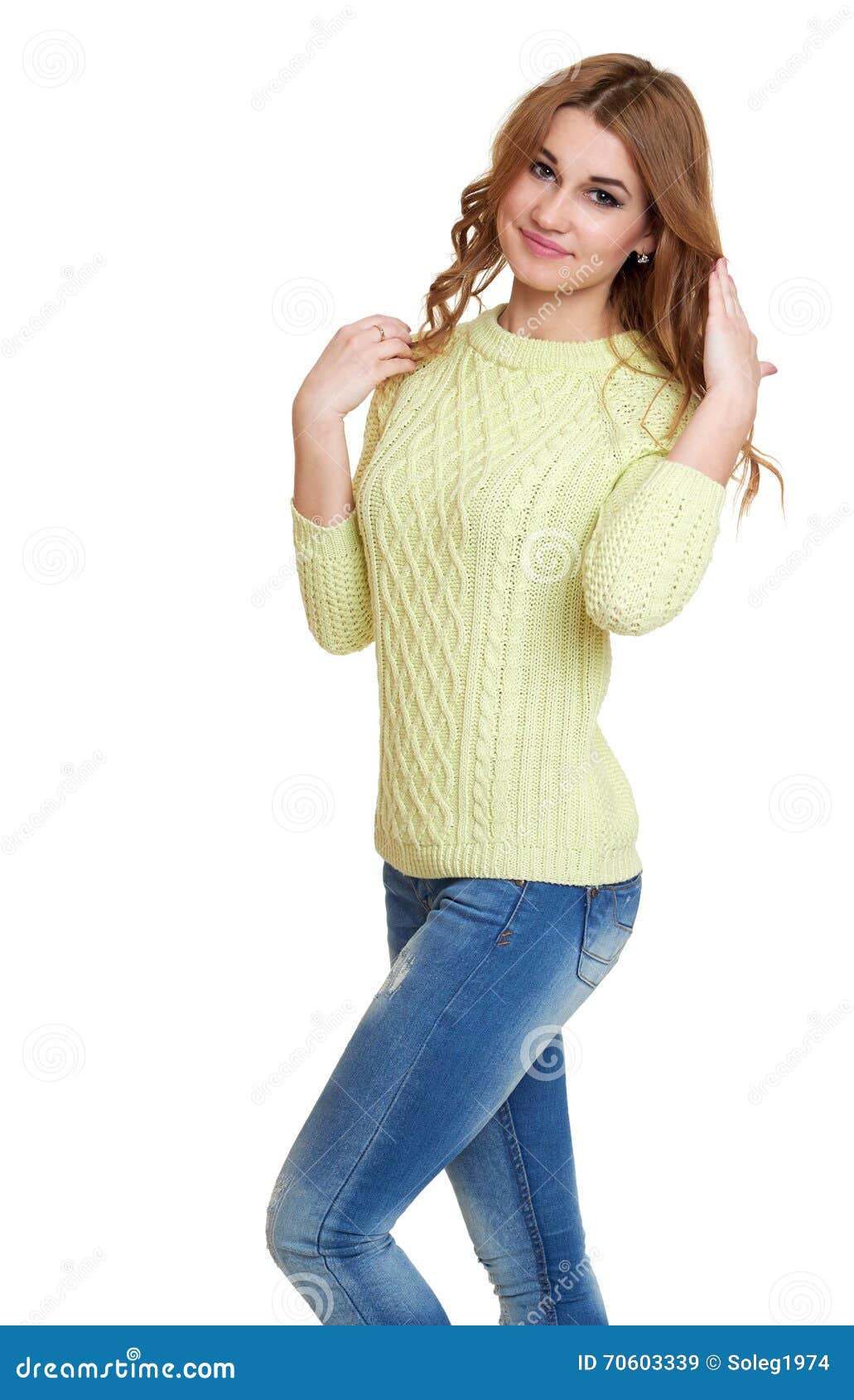 Young Girl Casual Dressed Jeans and a Green Sweater Posing in Studio on ...