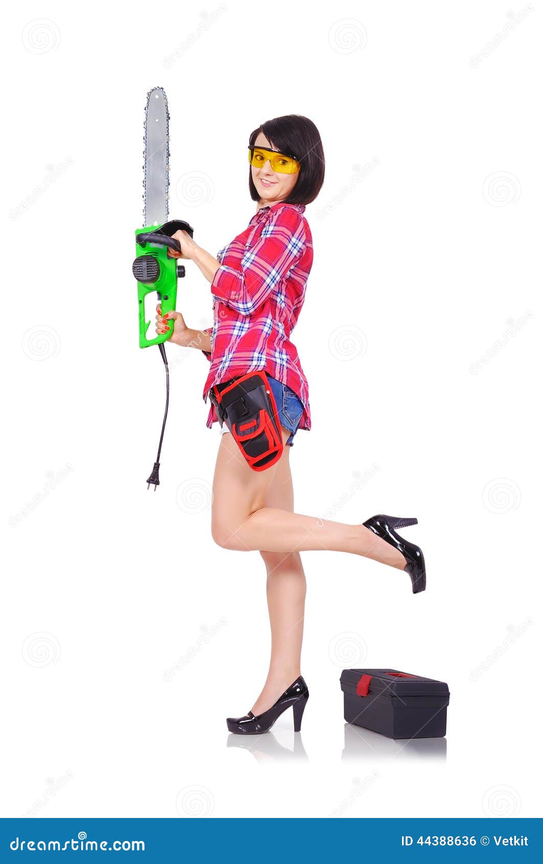 Young girl with chainsaw stock photo. Image of girl, beautiful 44388636